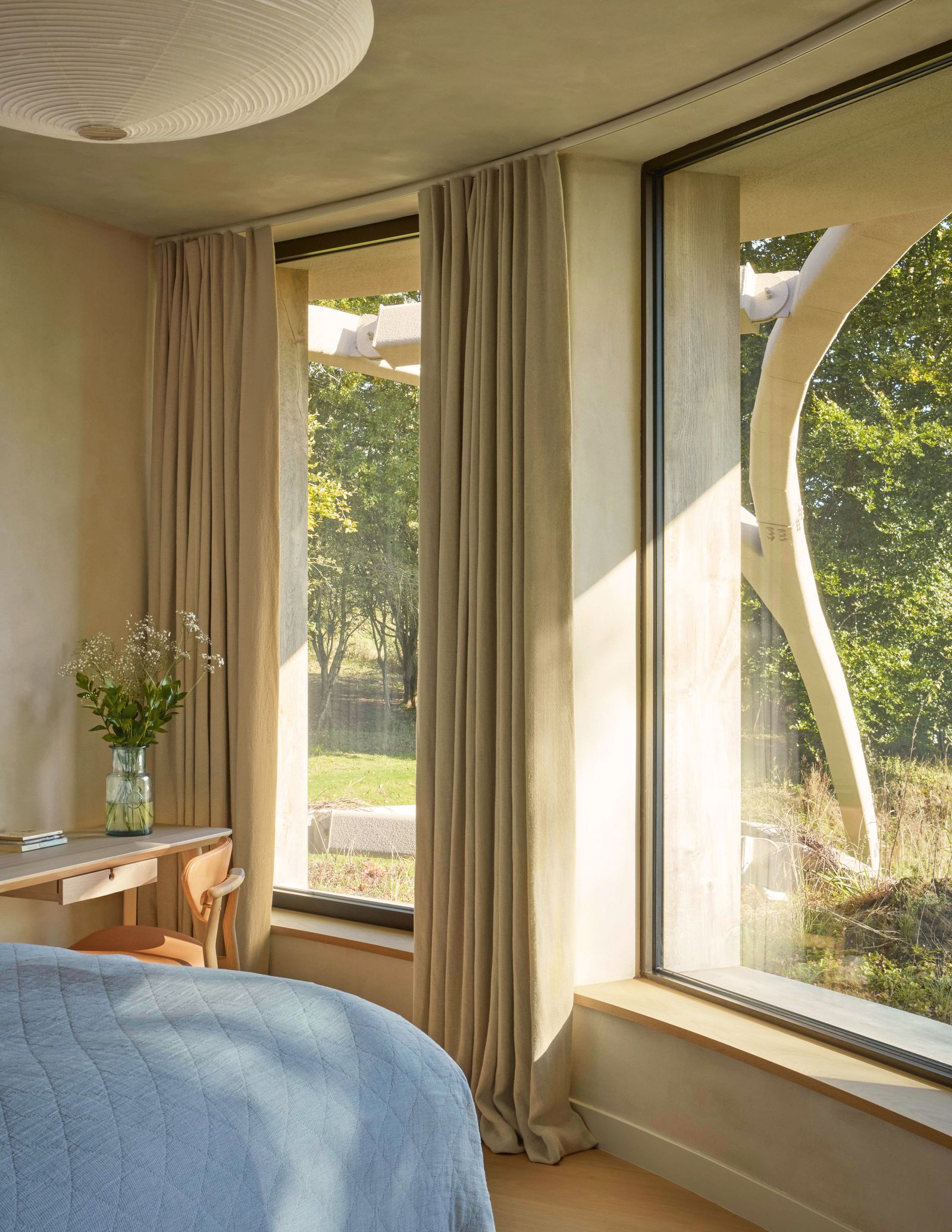 Image may contain Window Chair Furniture Bed Windowsill Bay Window French Window Indoors and Interior Design