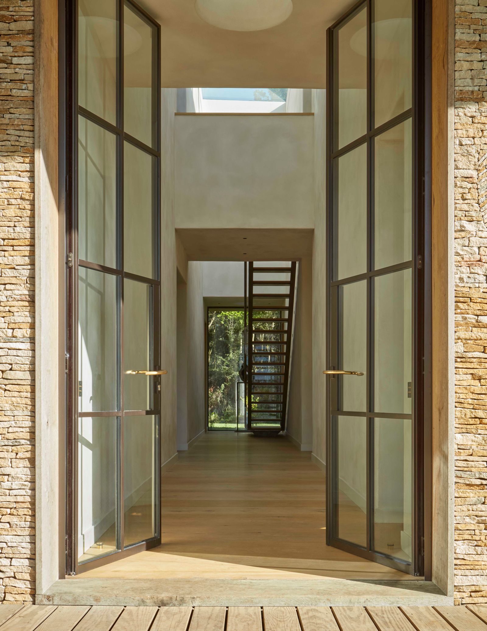 Image may contain Door Floor Architecture Building Housing French Window Window Indoors Interior Design and House