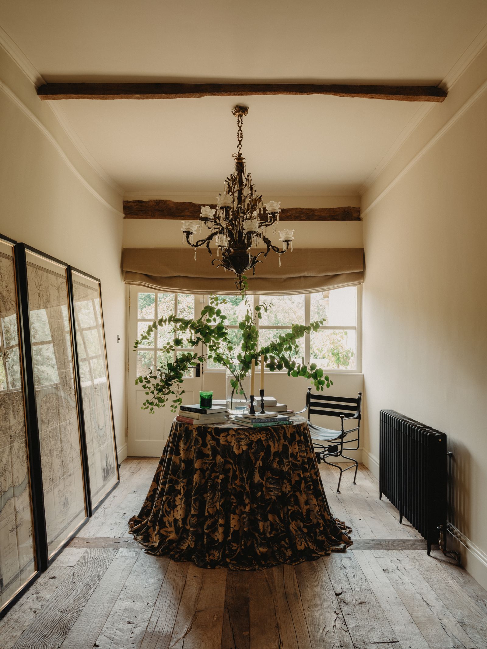 In the entrance hall the reclaimed oak flooring from Lubelska has been laid in different directions to create visual...