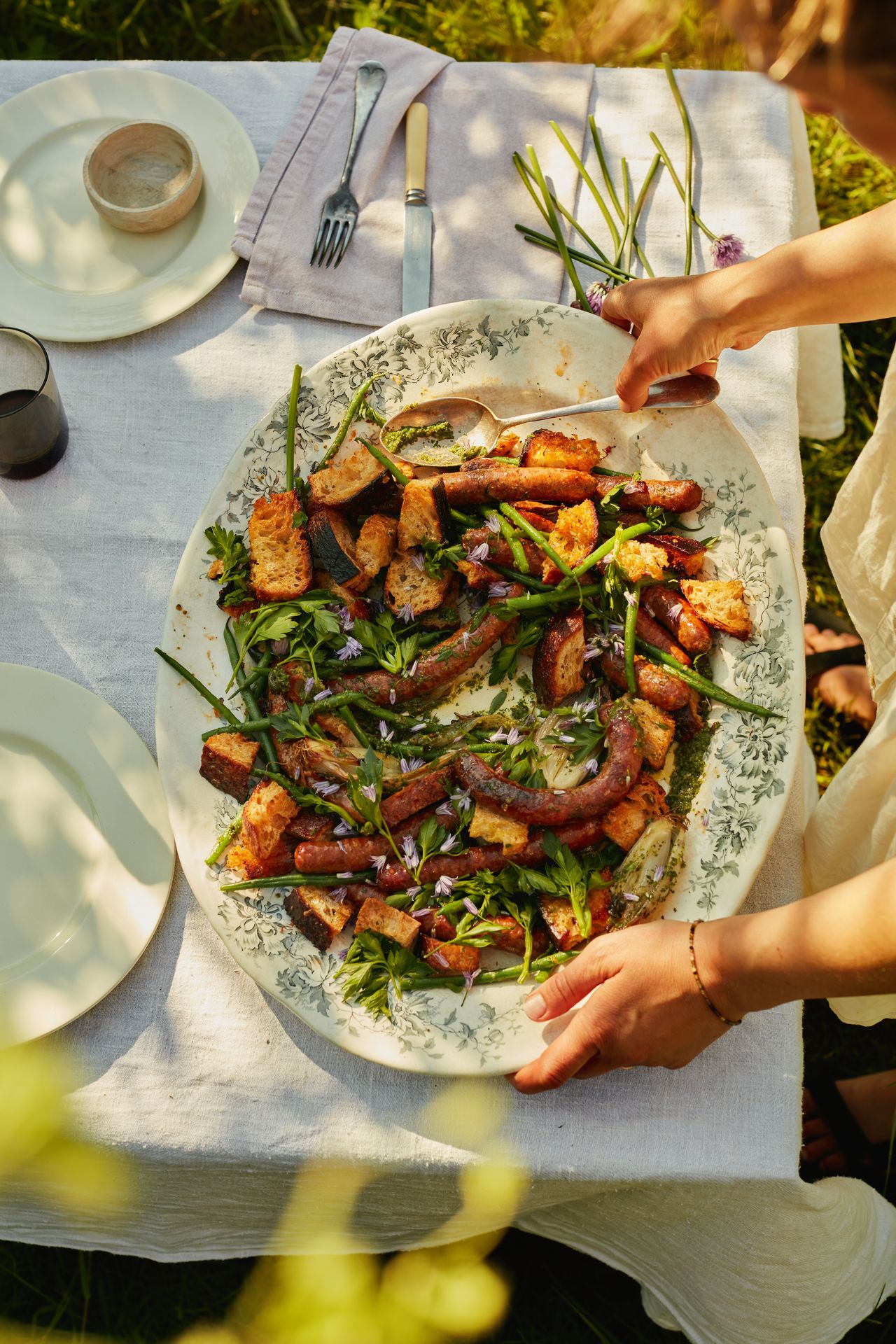 Merguez with green beans and shallot and herb sauce