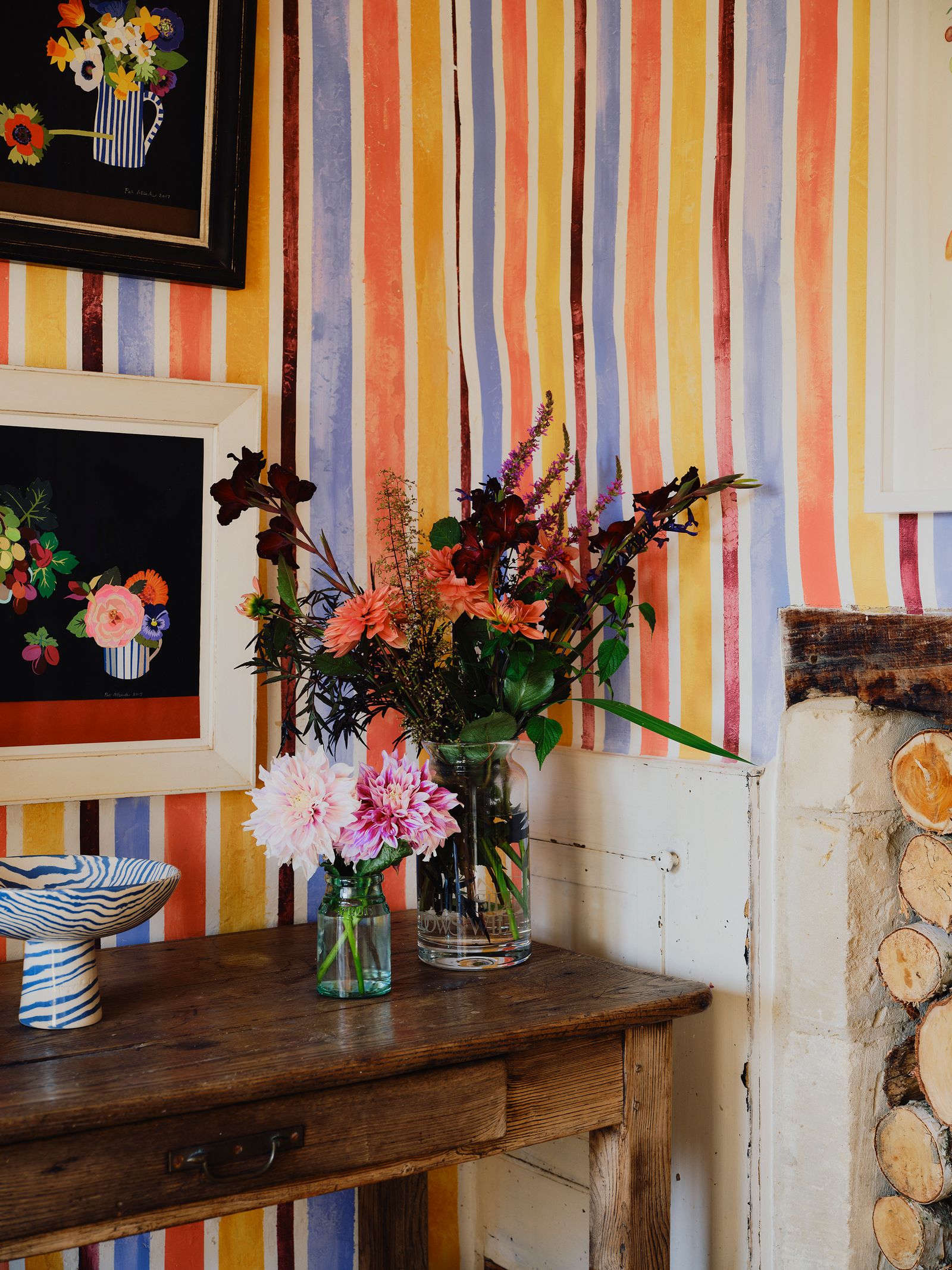 A detail of the entrance hall with colourful flowers freshly gathered from the garden.