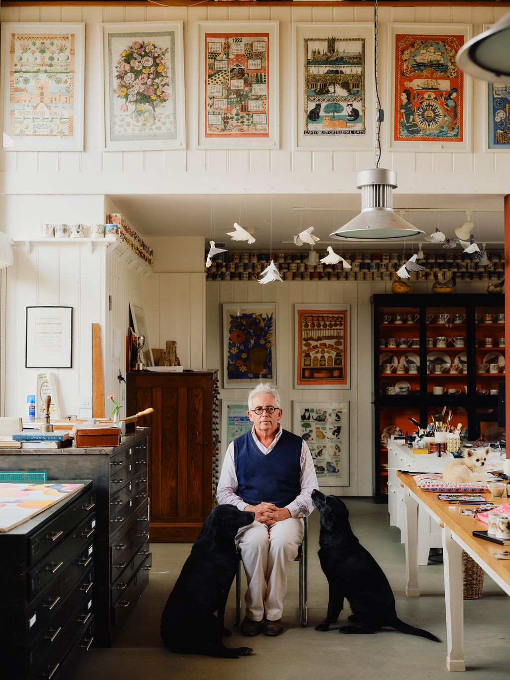 Matthew in the studio with his dogs the Labradors Coot and Vole and Cookie the Chihuahua.