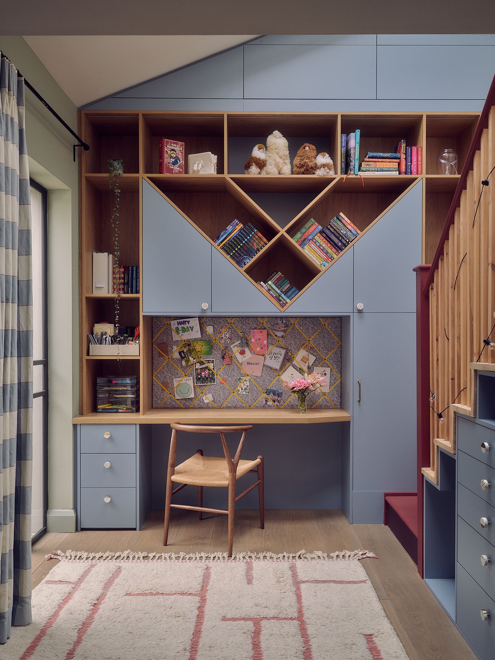 In the teenager's bedroom of this house by Spencer Wedekind bespoke joinery offers not just a workspace but plenty of...