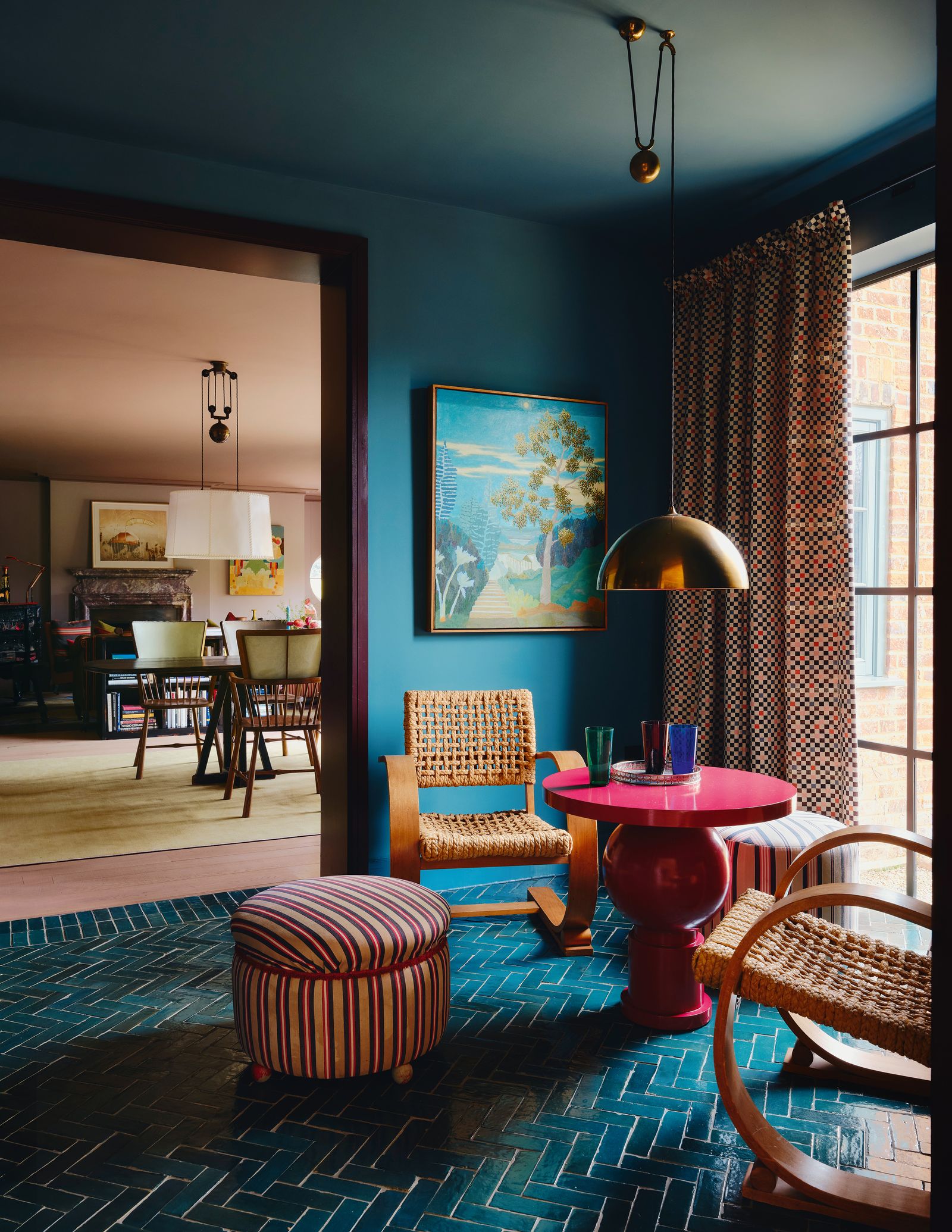 In the Arts and Crafts house decorated by Nicola Harding an awkward corridor between the drawing room and kitchen has...