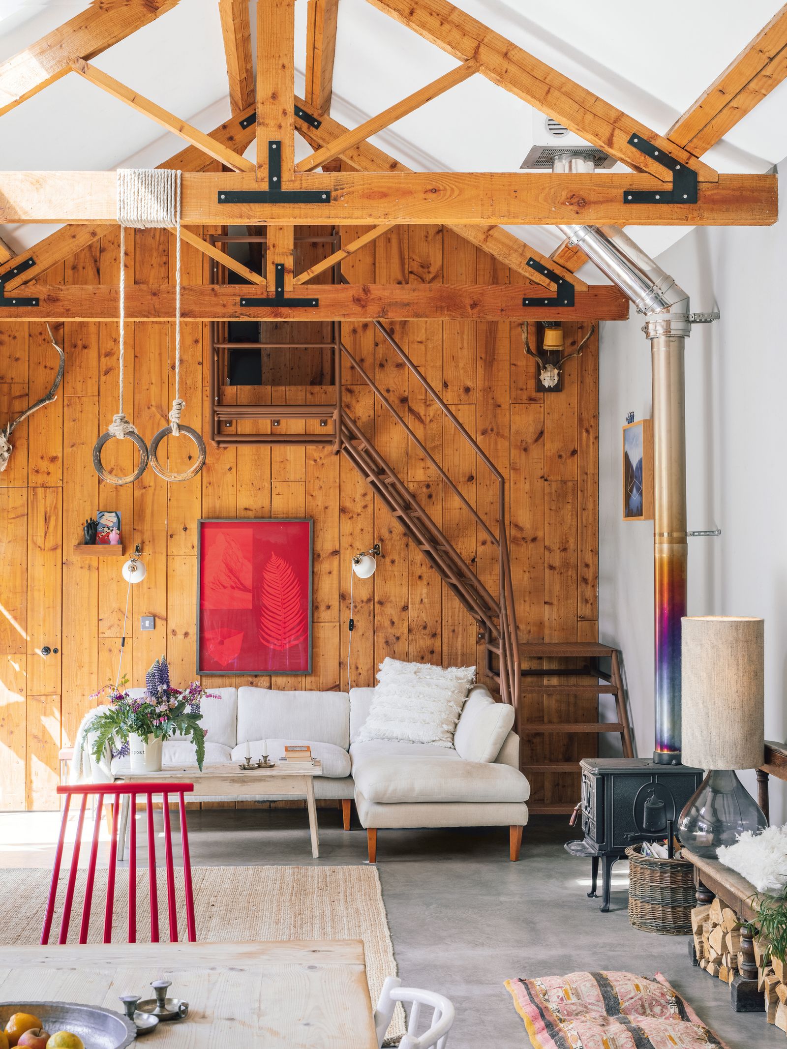 She converted a carpenters workshop into a house with an adjacent studio. The red print is by Eimearjean McCormack.