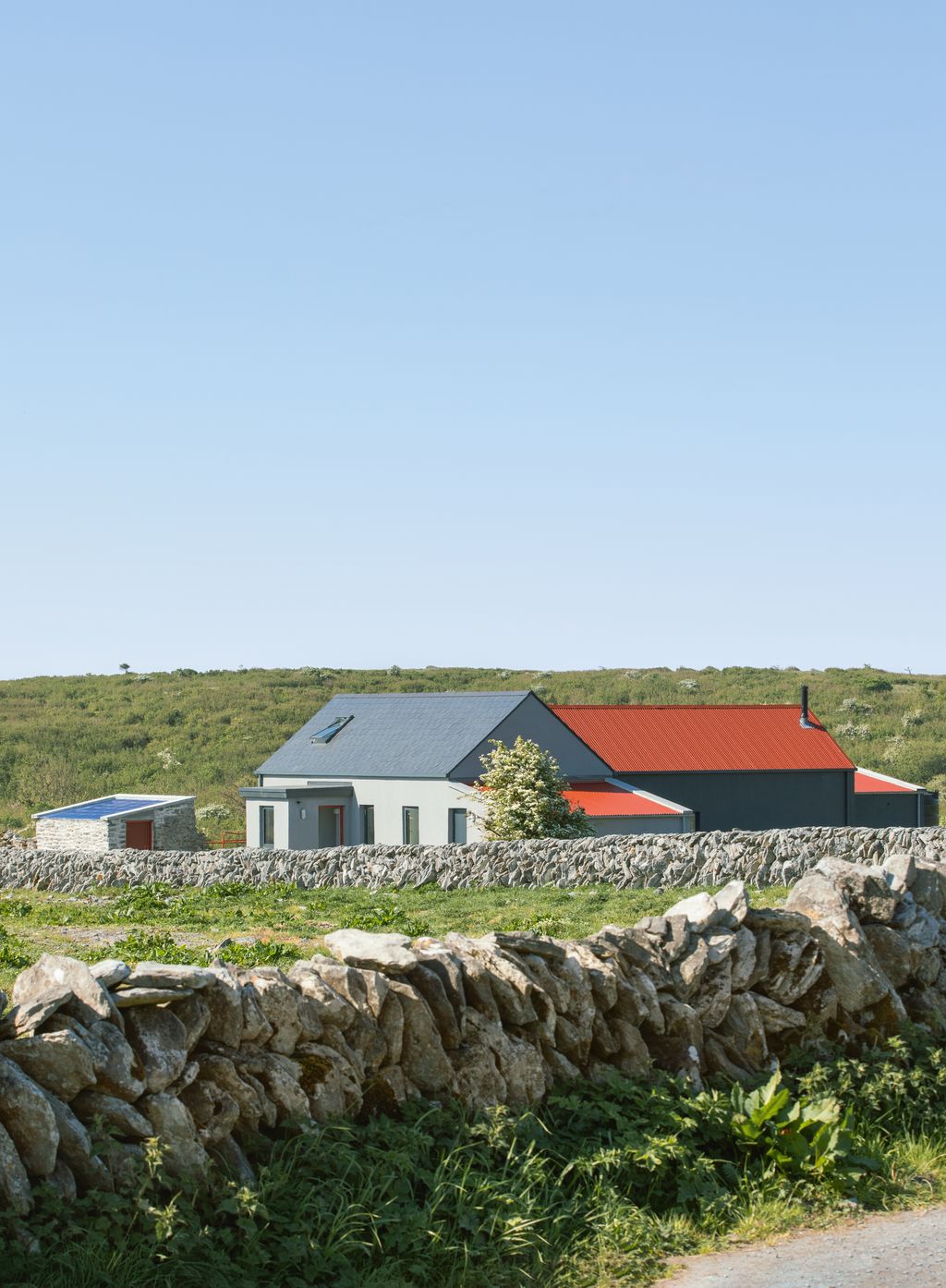 Inspired by the style of Icelandic houses and their traditional red roofs Summerage stands out against the stark...