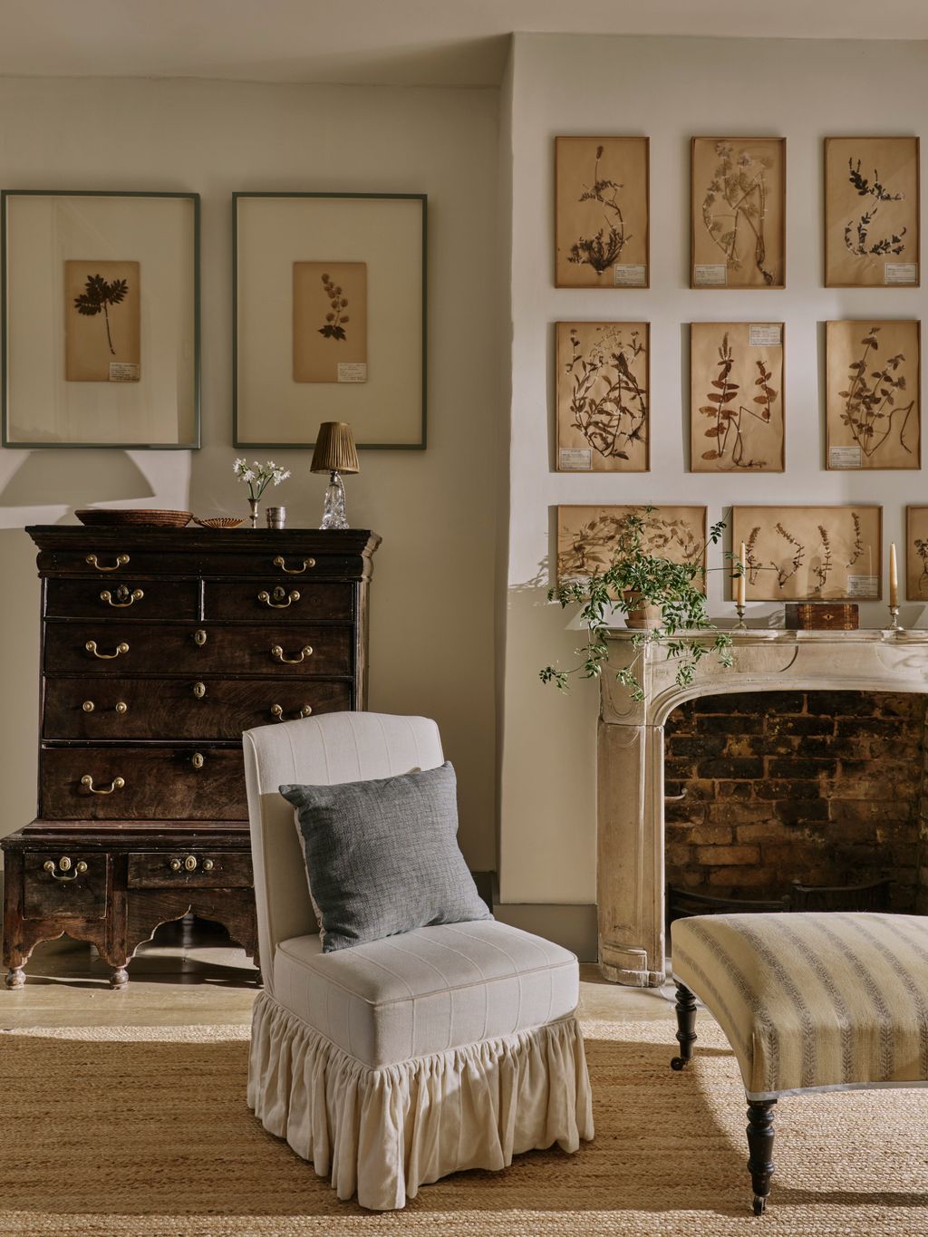 In the corner of Sally's bedroom an 18thcentury oak chest on stand provides storage. A midcentury glass lamp with a silk...