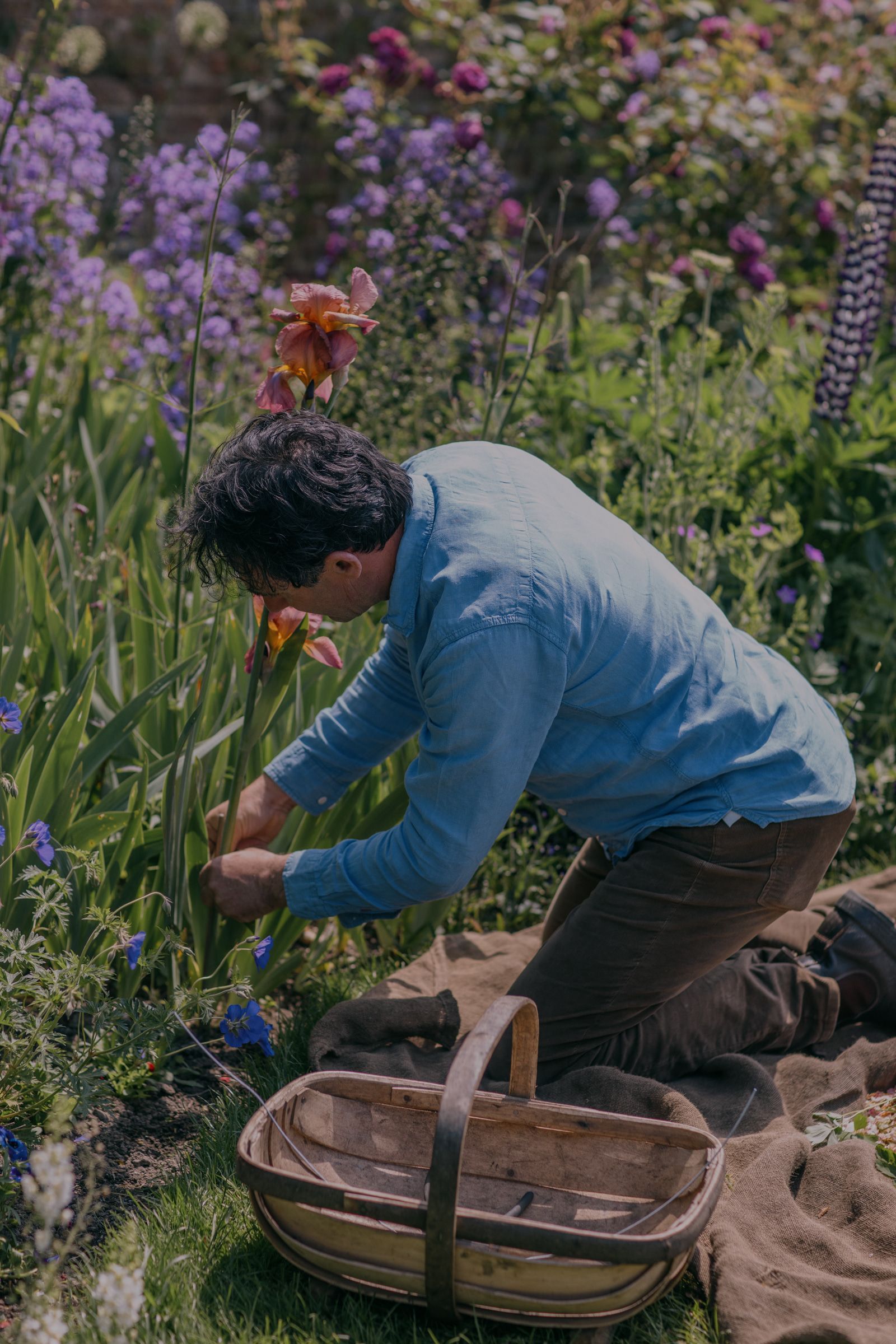 Troy taking cuttings from the garden.