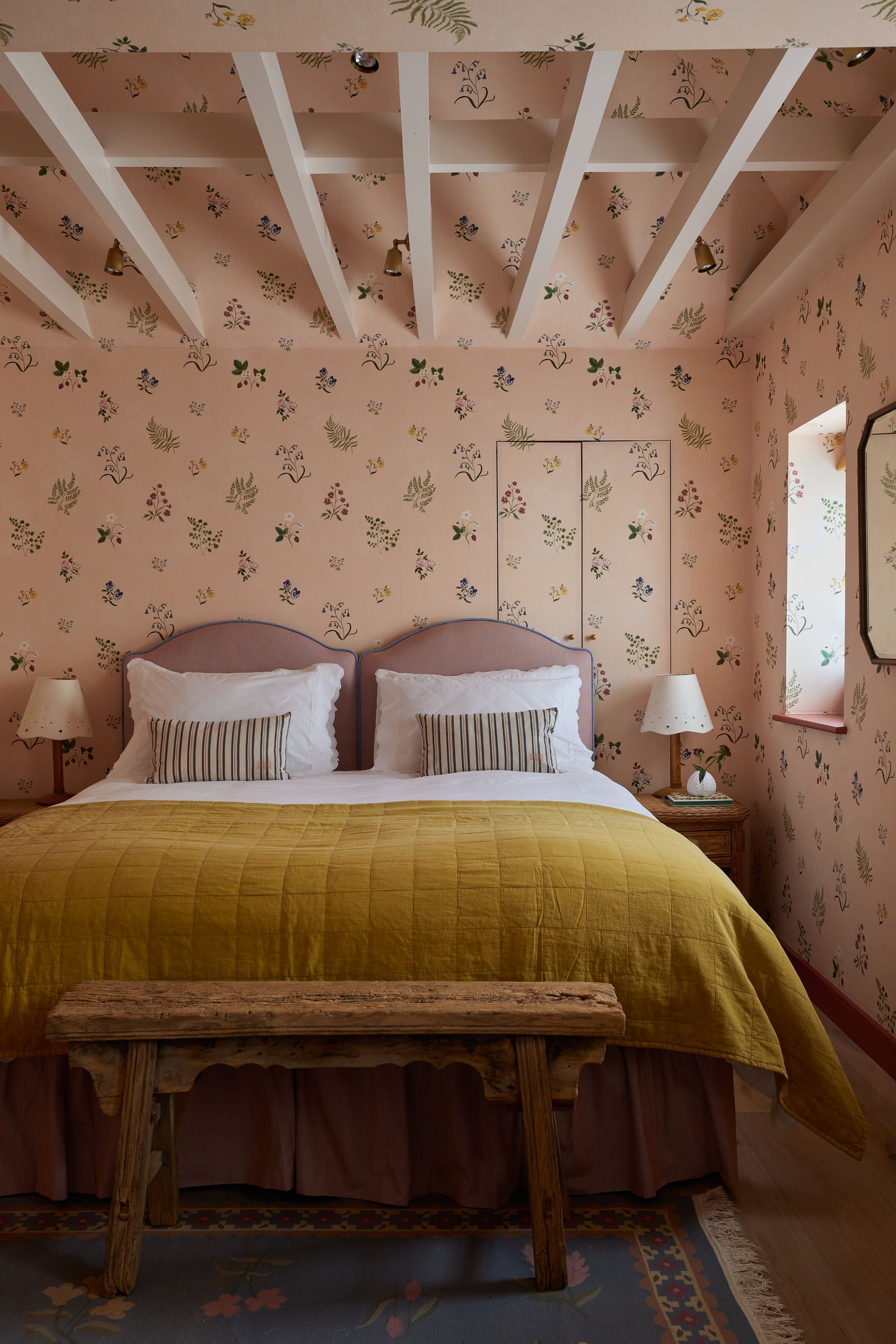 Tess Newalls ‘Herbarium wallcovering in the bedroom of a Sussex cottage by Vaughan Design amp Development.