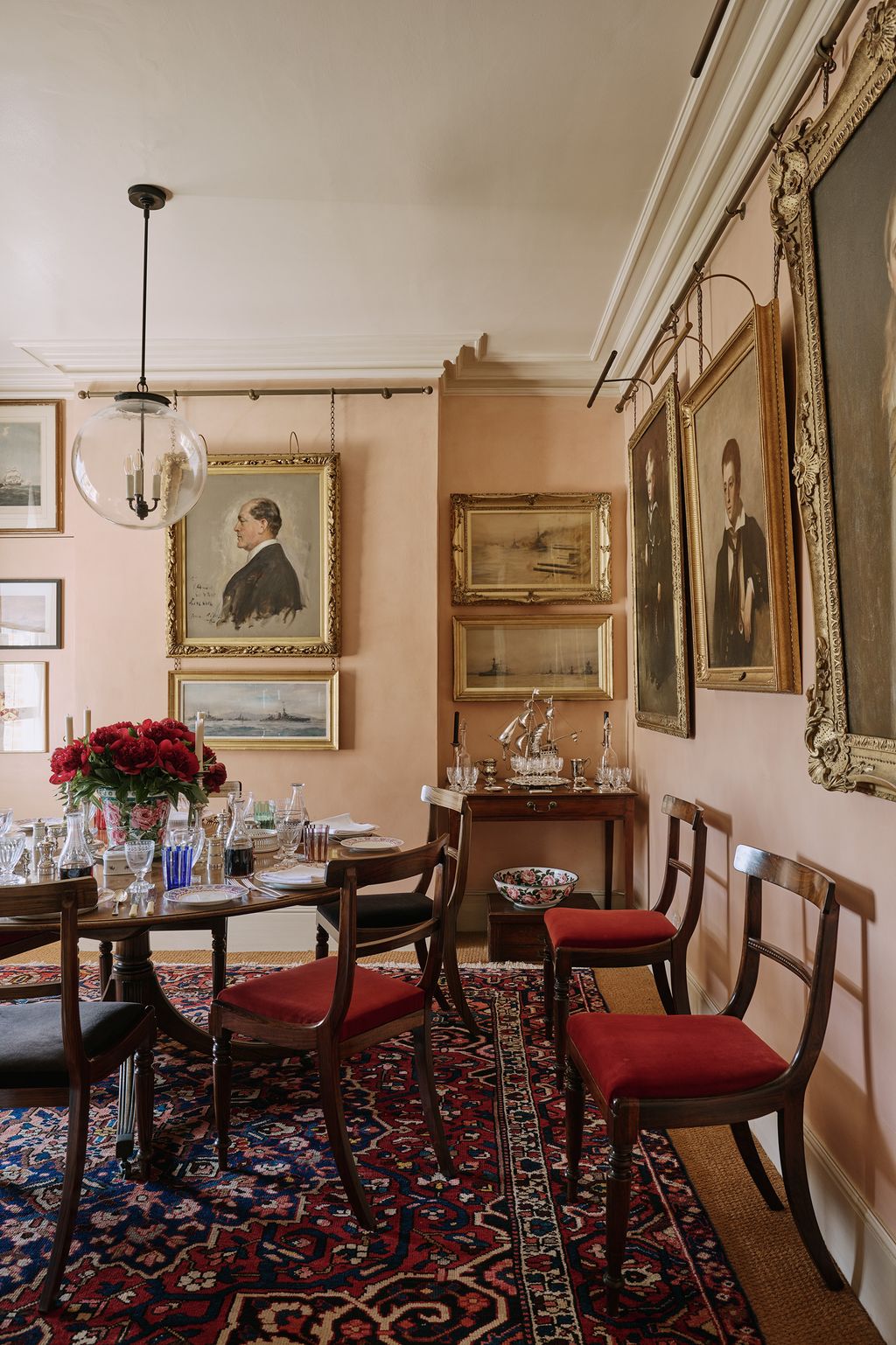 The walls in the dining room are a specialist finish and mix by Harry Lendrum. The pendant light is from Hector Finch.