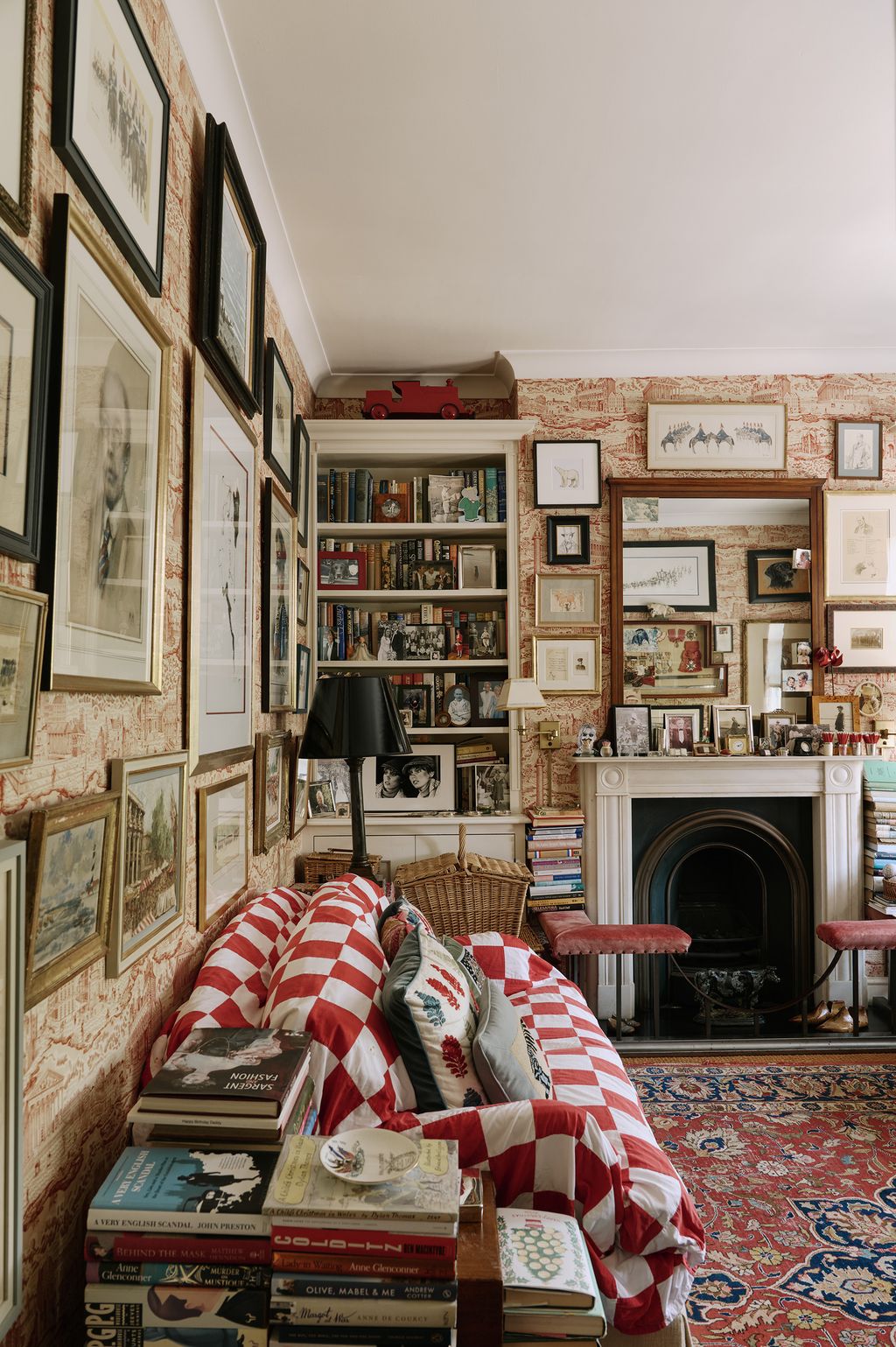 On the walls of the sitting room hangs a now discontinued Noblis toile wallpaper.