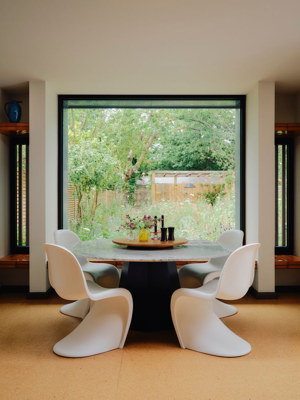 Once Clares studio meeting desk the bespoke kitchen table has been repainted to suit the room. Cevica tiles bring a...