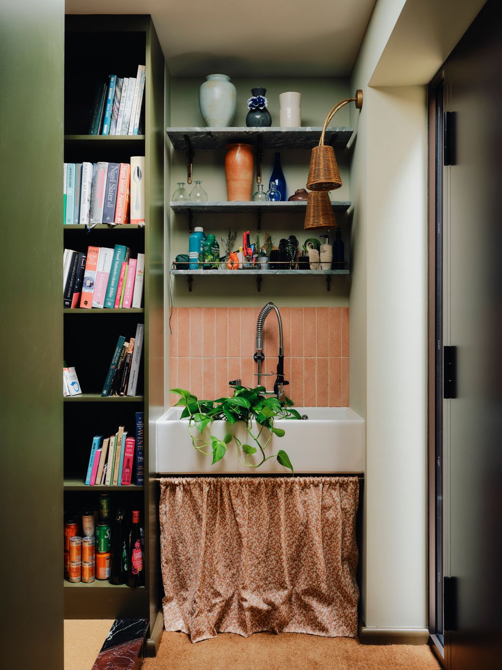 A Huck wall light from Porta Romana sets the tone in this corner with a Ca Pietra Reform splashback made from recycled...