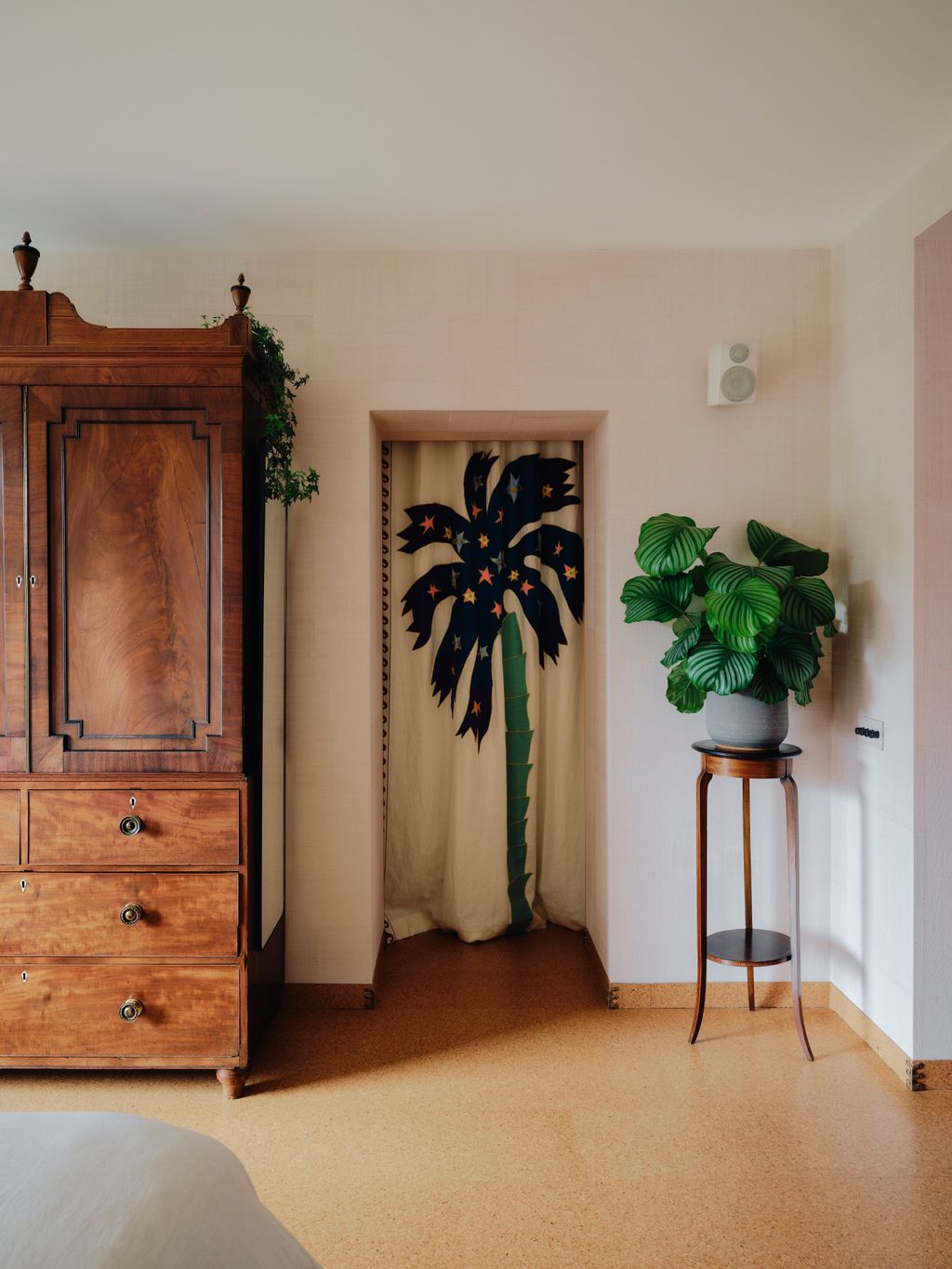 A family wardrobe one of the first pieces bought by Wills parents as newlyweds anchors the room. Curtain panels in a...