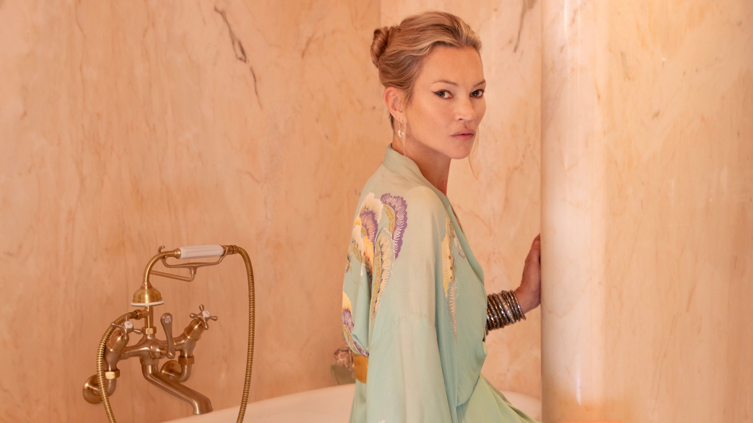 Inside Kate Mosss chic bathroom and 7 decor ideas to steal  pale pink bathroom with marble clad walls and unlacquered...