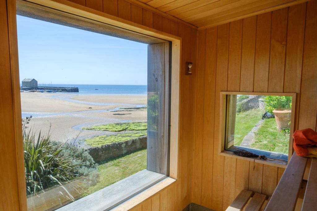 The private garden sauna at Wynd Housea historic family home in the East Neuk of Fife offers sweeping views over Elie...