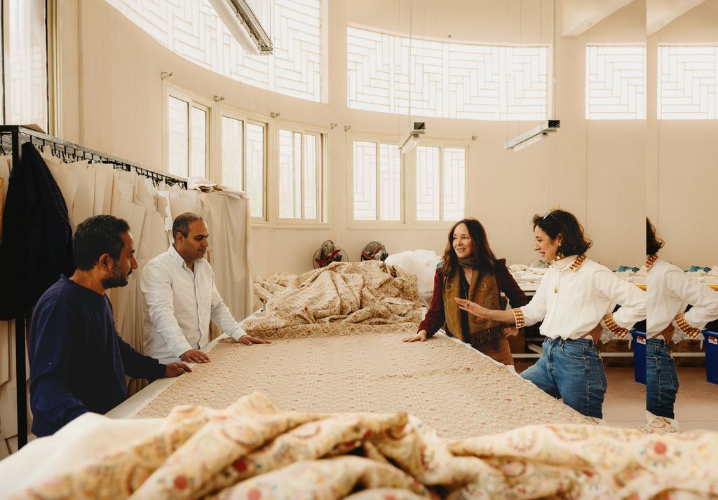 Goya and Cruz with their factory manager Shenouda Lourance Younan  and production manager Magdy Anwar Helmy.