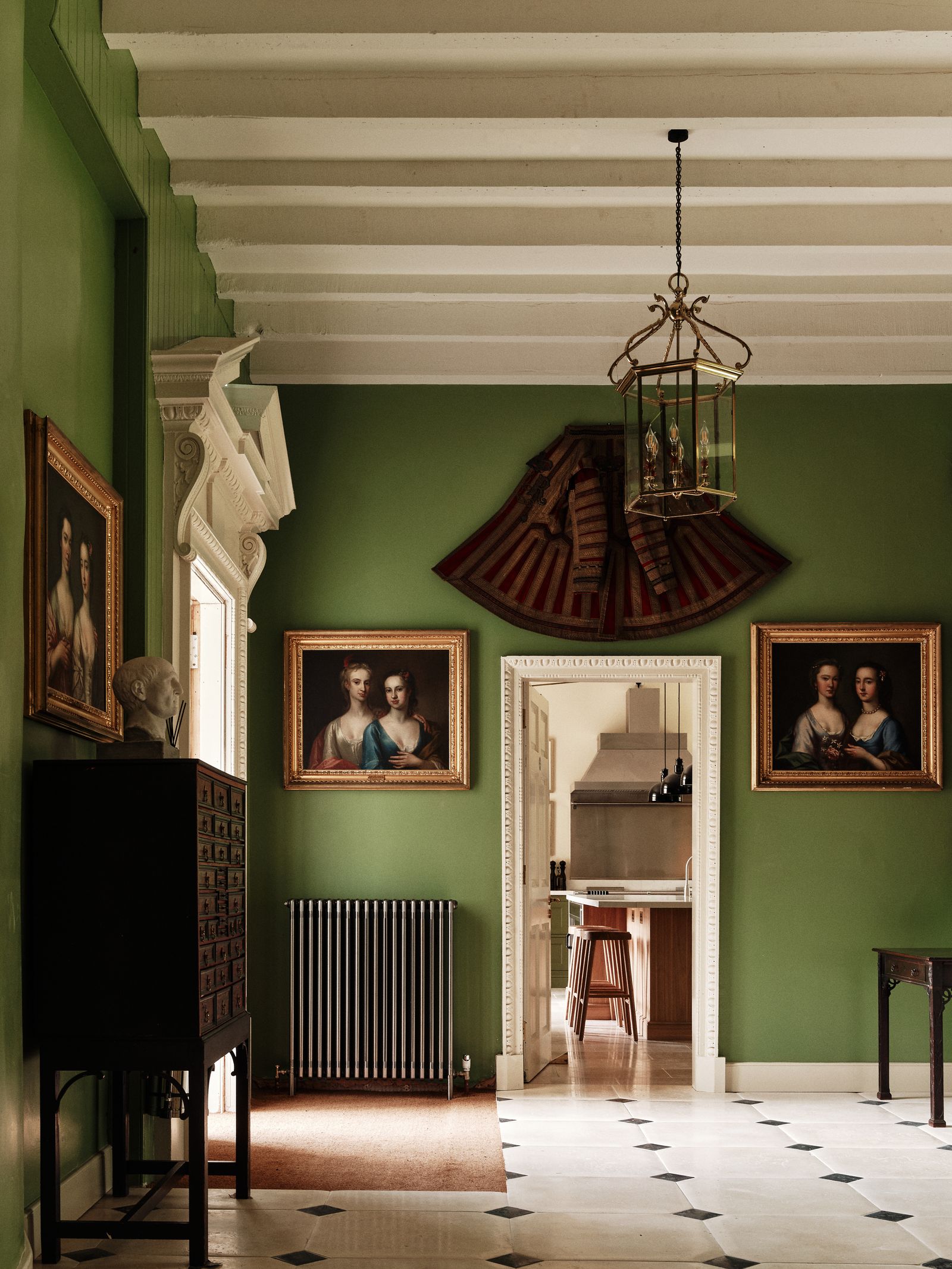 Double portraits in oils from the owners extensive collection grace the walls of the house.