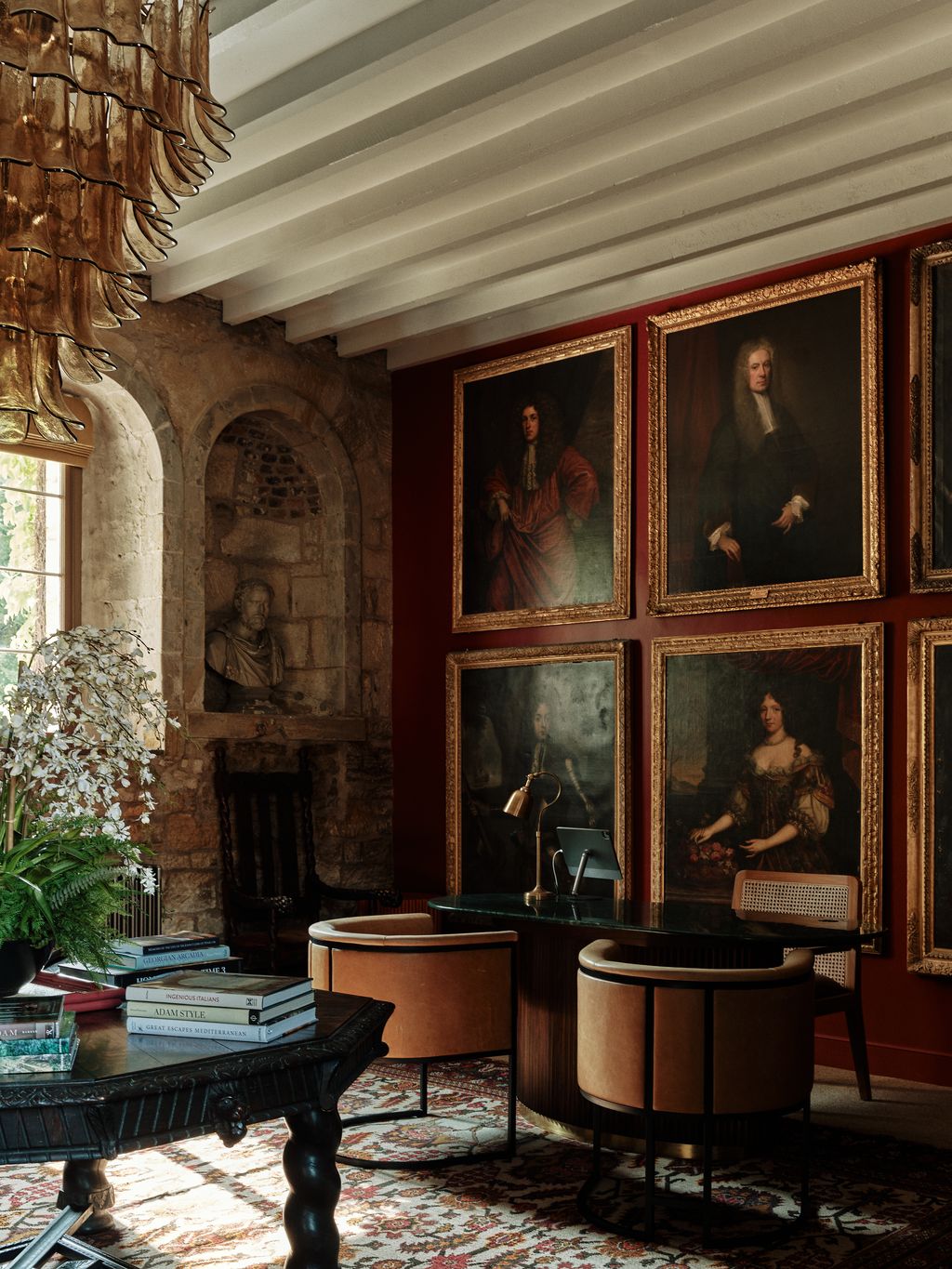 Antiques and vintage pieces are combined withnbspcontemporary furniture against a backdrop of oil paintings depicting...