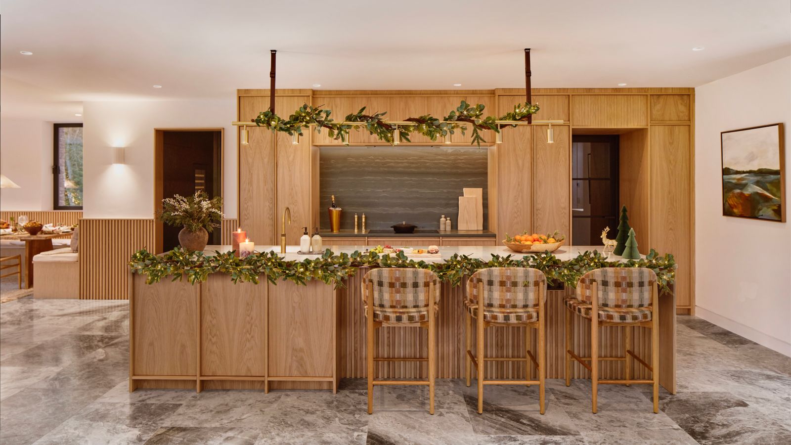 The kitchen features handcrafted cabinetry and stateoftheart appliances.