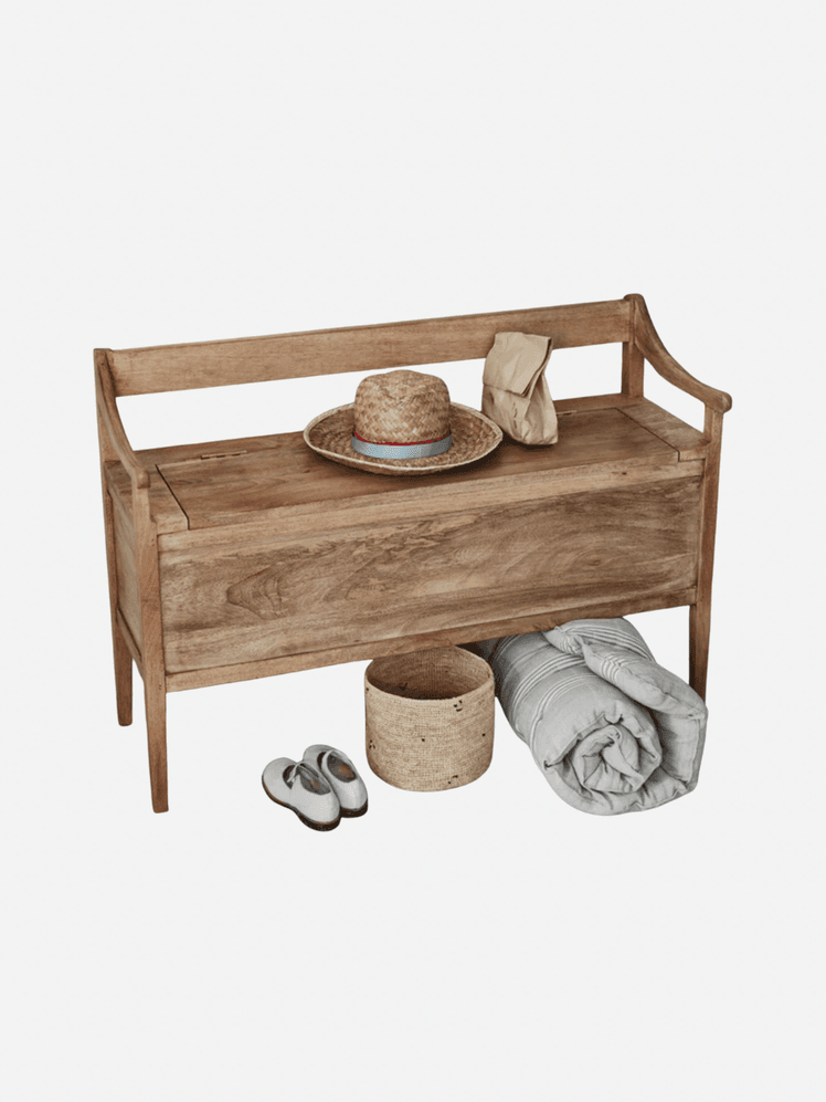 Image may contain: Coffee Table, Furniture, Table, Clothing, Hat, Wood, Home Decor, and Linen