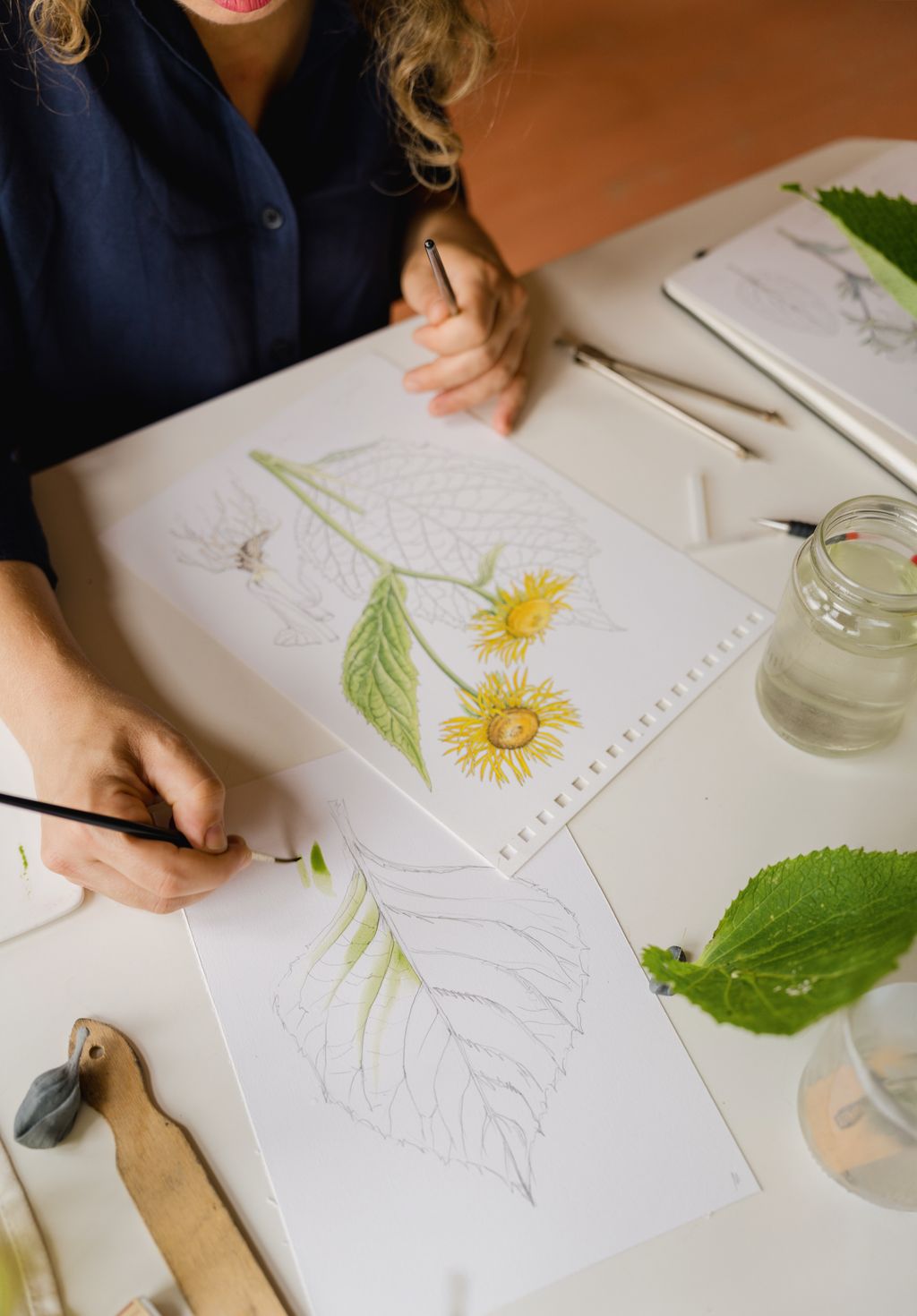 Image may contain Art Drawing Adult Person Brush Device and Tool