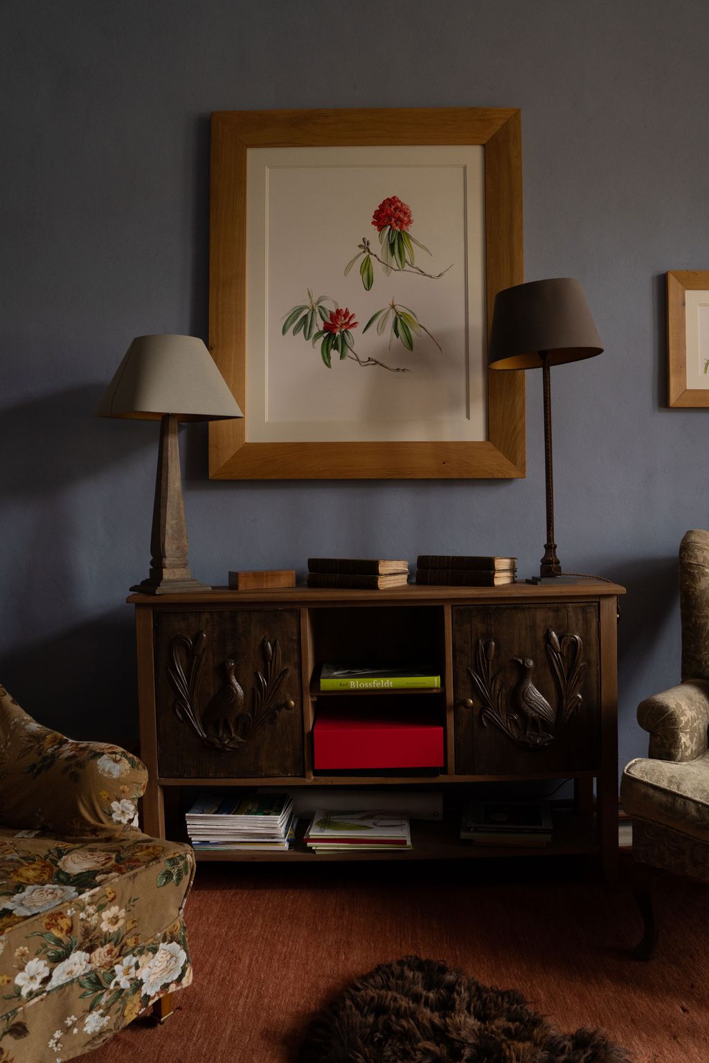 Image may contain Lamp Art Painting Indoors Interior Design Table Lamp Furniture Sideboard and Chair