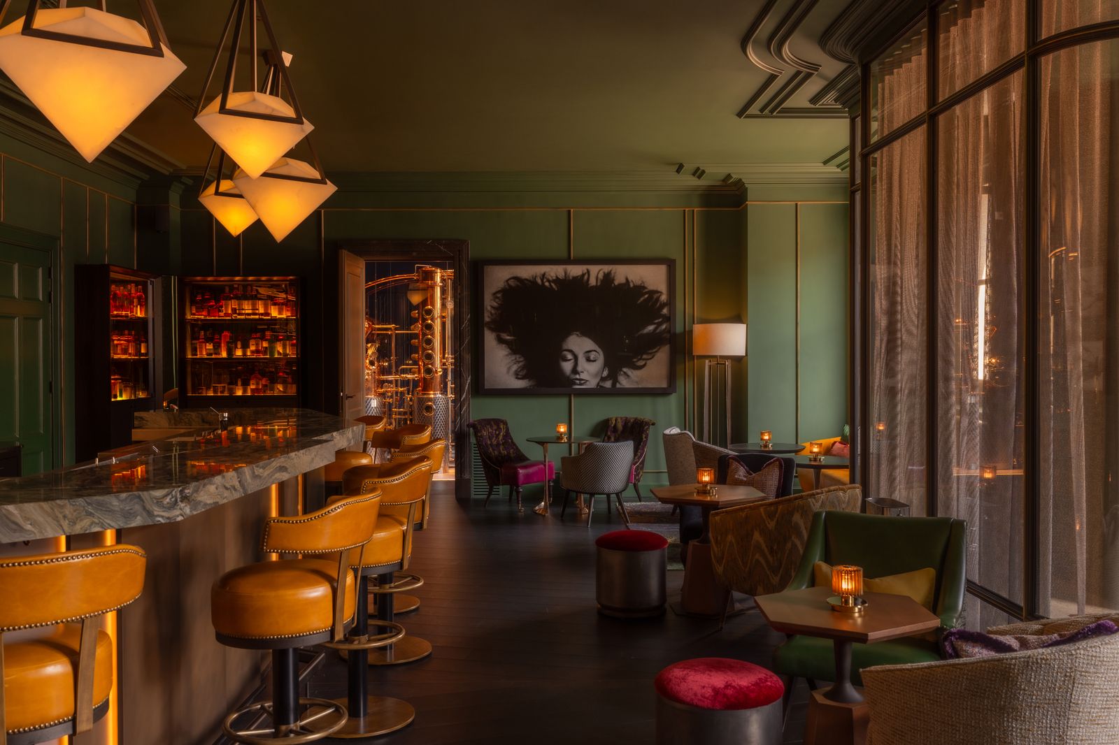 Image may contain Kate Bush Chair Furniture Art Painting Lamp Indoors Face Head Person Restaurant and Bar