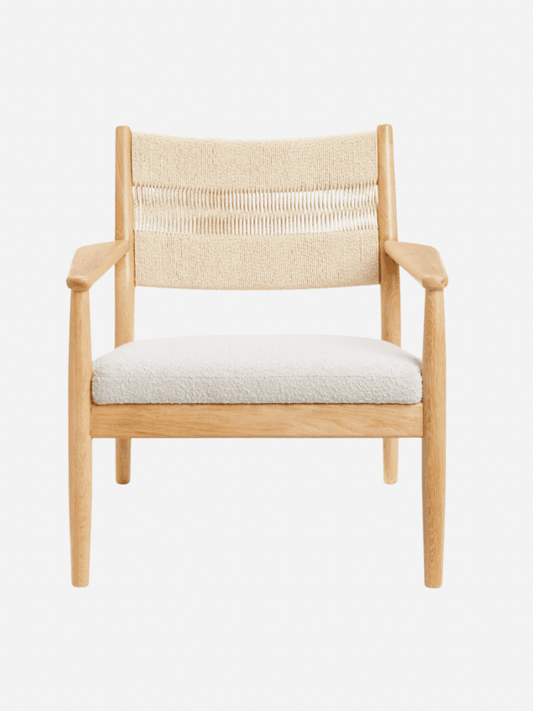 Image may contain: Chair, Furniture, Armchair, Cushion, and Home Decor