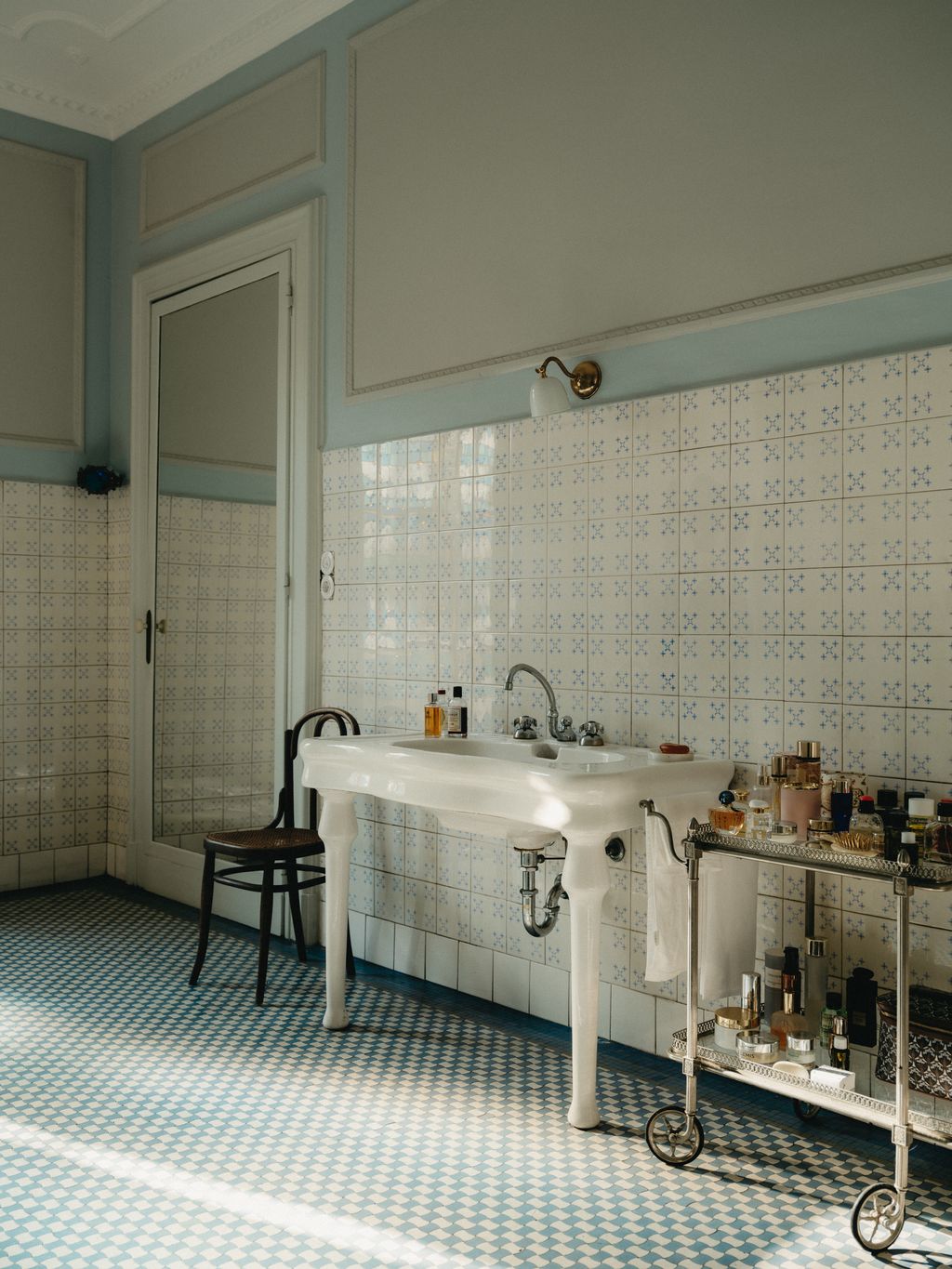 Image may contain Chair Furniture Sink Sink Faucet Lamp Home Decor Indoors and Interior Design