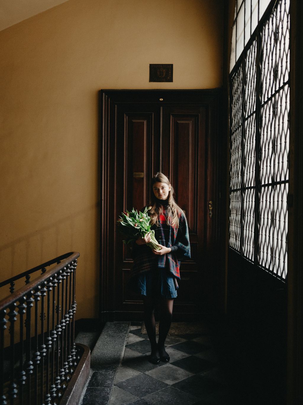 Image may contain Flower Flower Arrangement Flower Bouquet Plant Person Teen Clothing Coat Face and Head