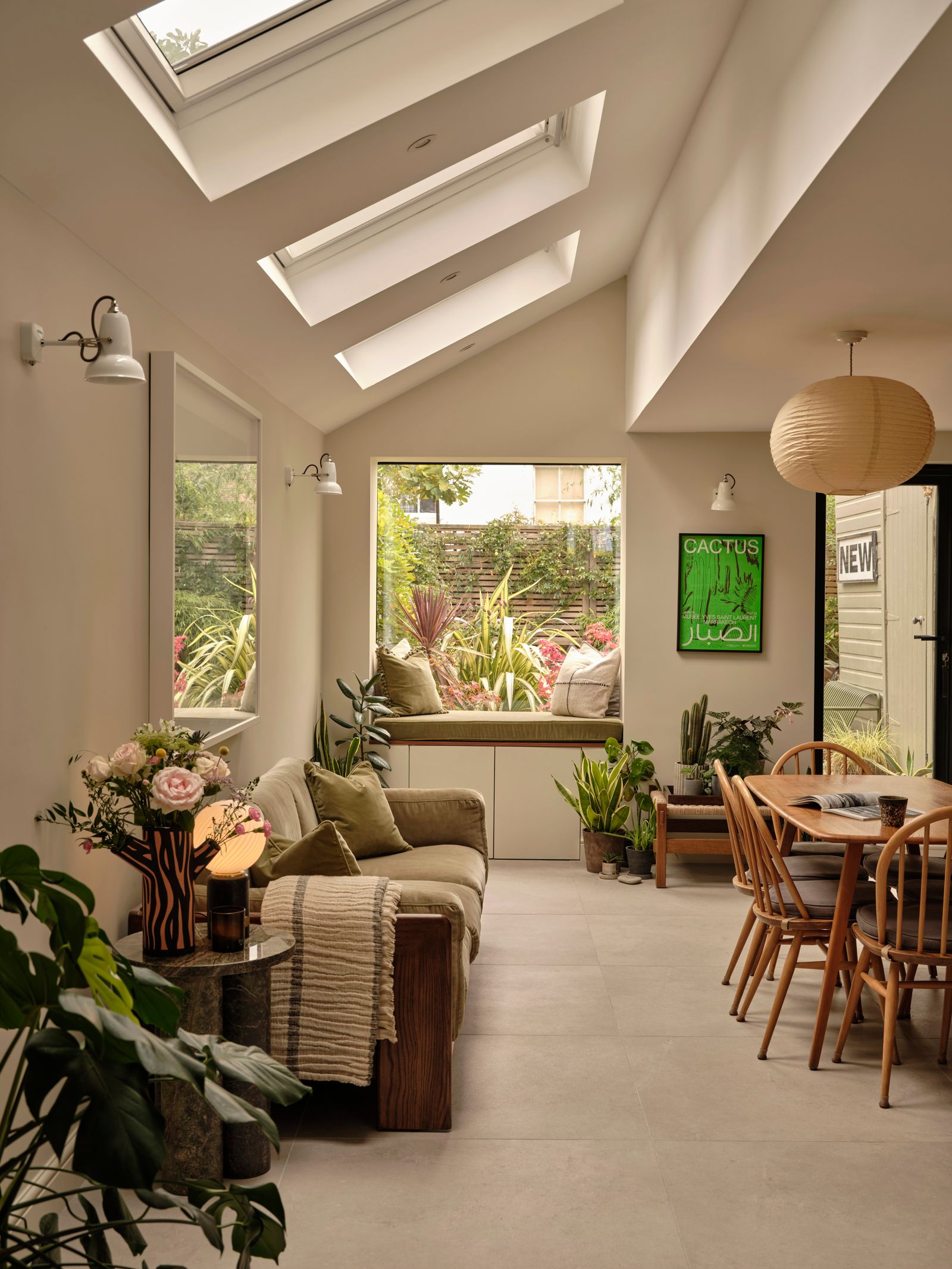 Image may contain Window Floor Architecture Building Skylight Home Decor Chair Furniture Table Cup and Indoors