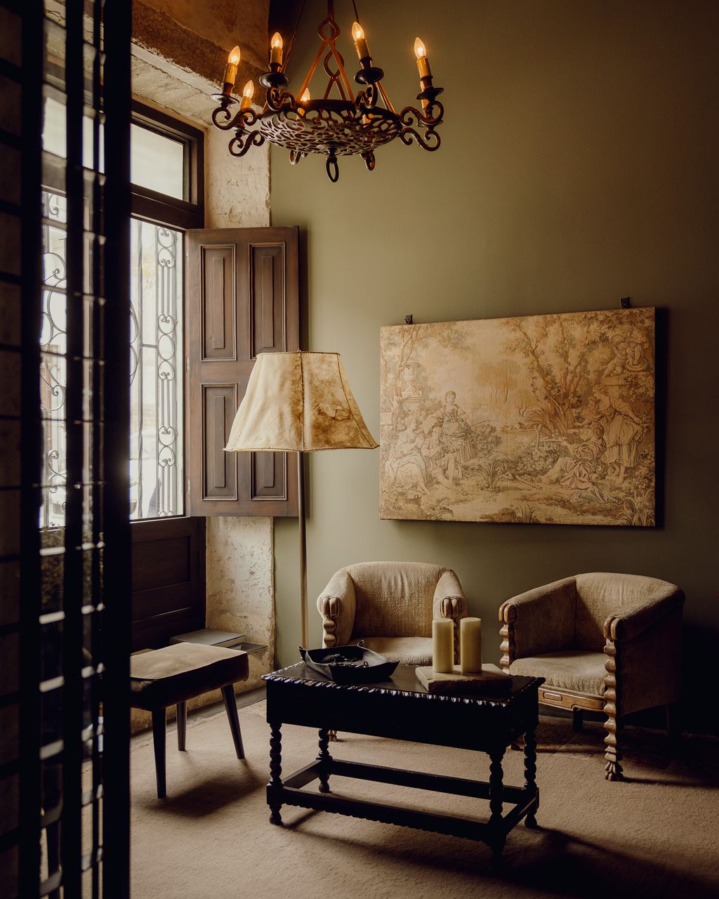 Image may contain Lamp Home Decor Architecture Building Furniture Indoors Living Room Room and Chandelier