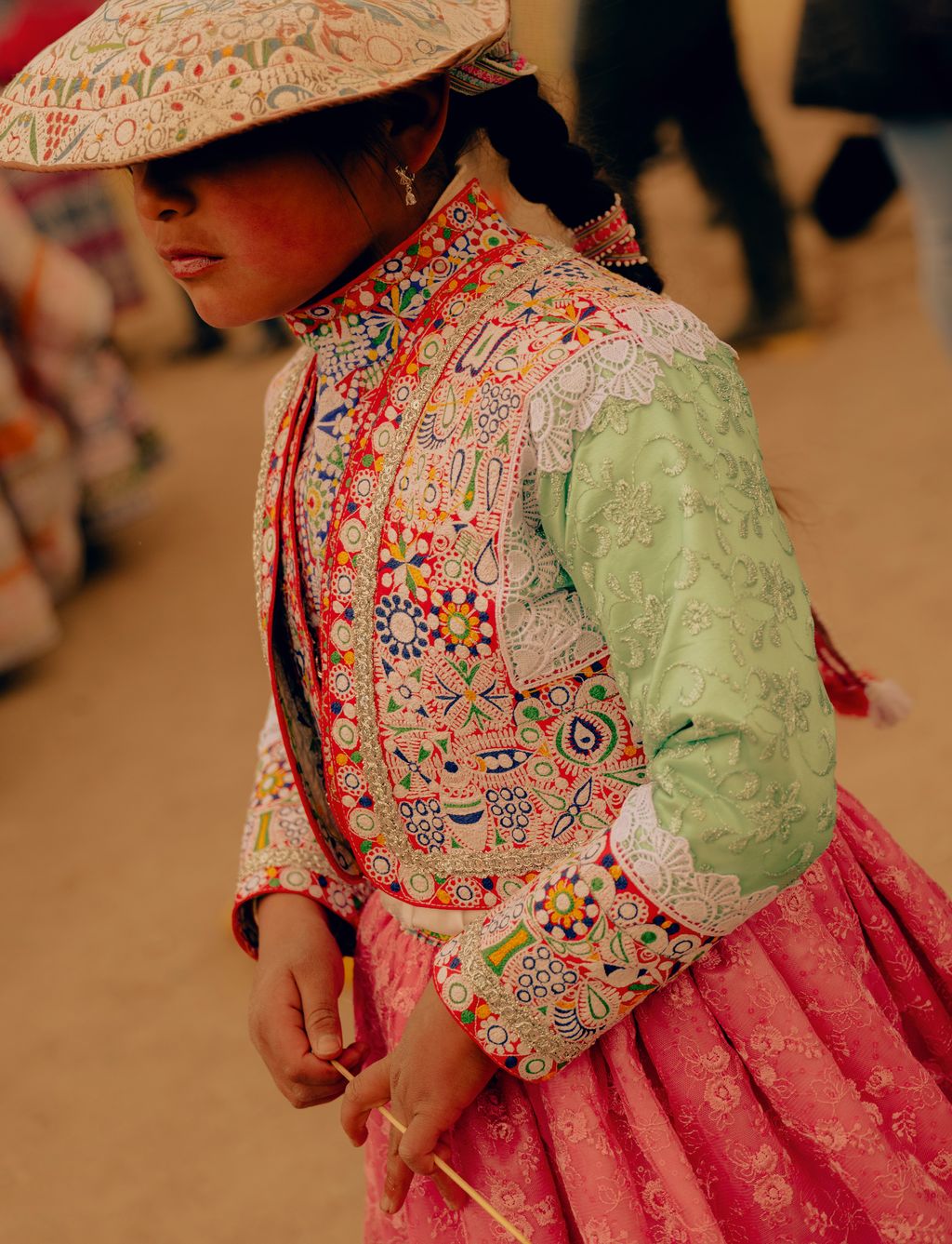 Image may contain Adult Person Face Head and Pattern