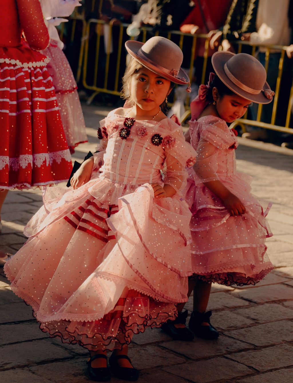 Image may contain Person Clothing Costume Child Face Head Hat Adult Wedding Dancing and Leisure Activities