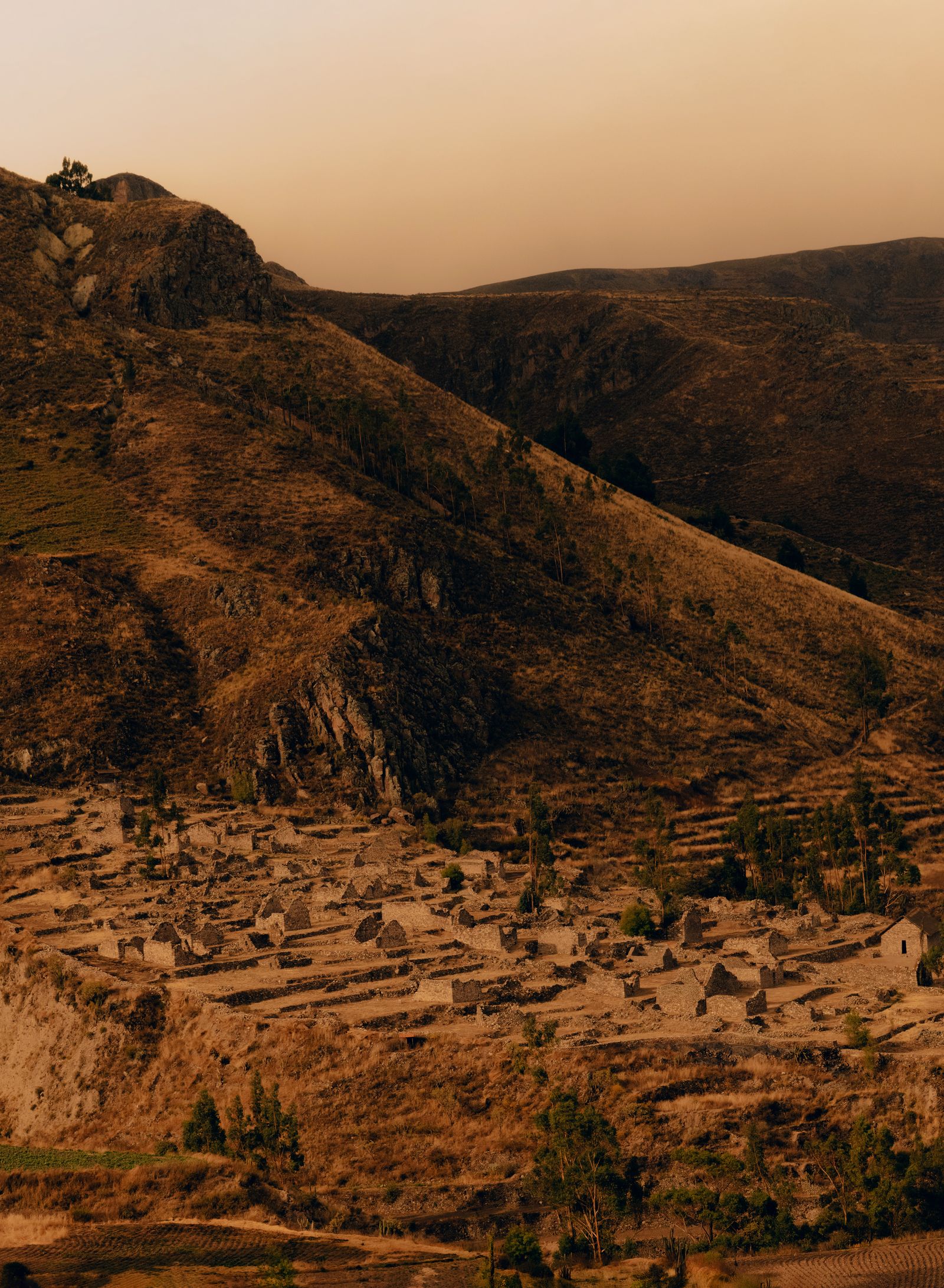 Image may contain Nature Outdoors Wilderness Slope Plateau Ground Rock Scenery Countryside Plant and Vegetation