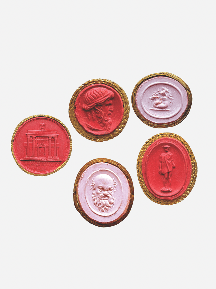 Image may contain Wax Seal and Person