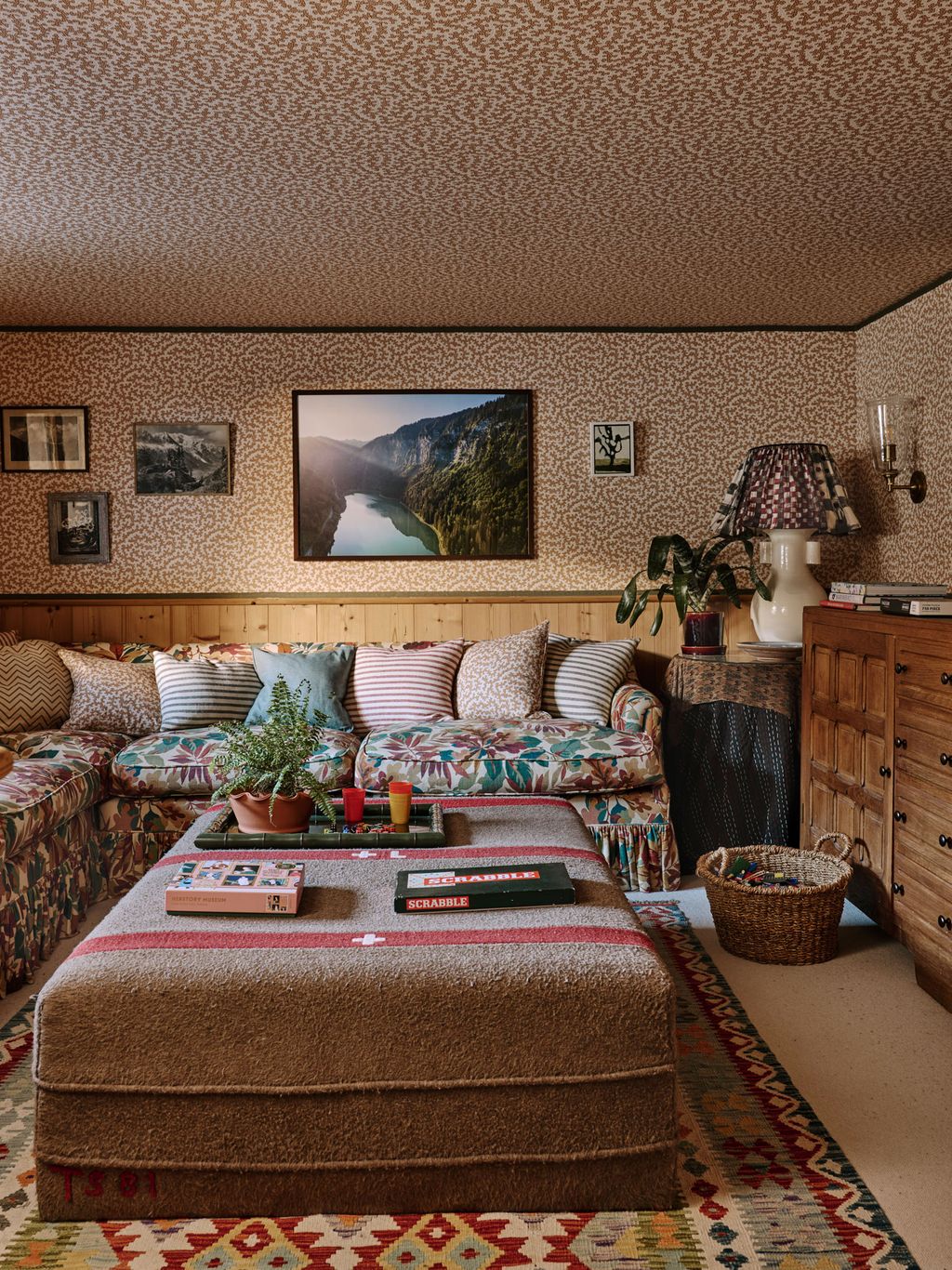 Image may contain Home Decor Furniture Plant Art Painting Lamp Indoors and Interior Design