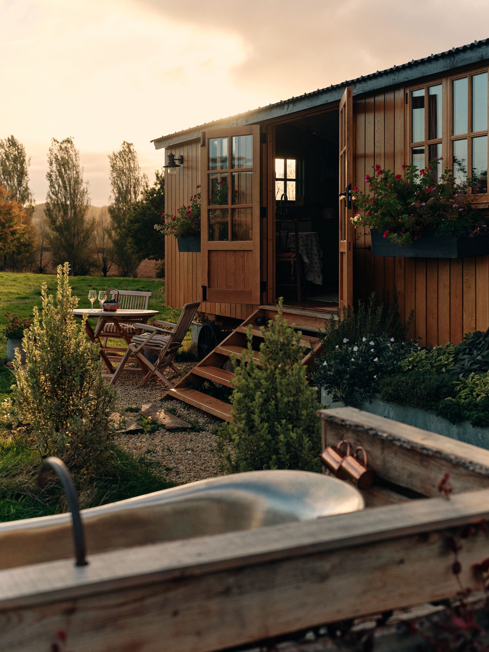 Image may contain Indoors Interior Design Tub Hot Tub Chair Furniture Wood Architecture Building and Housing