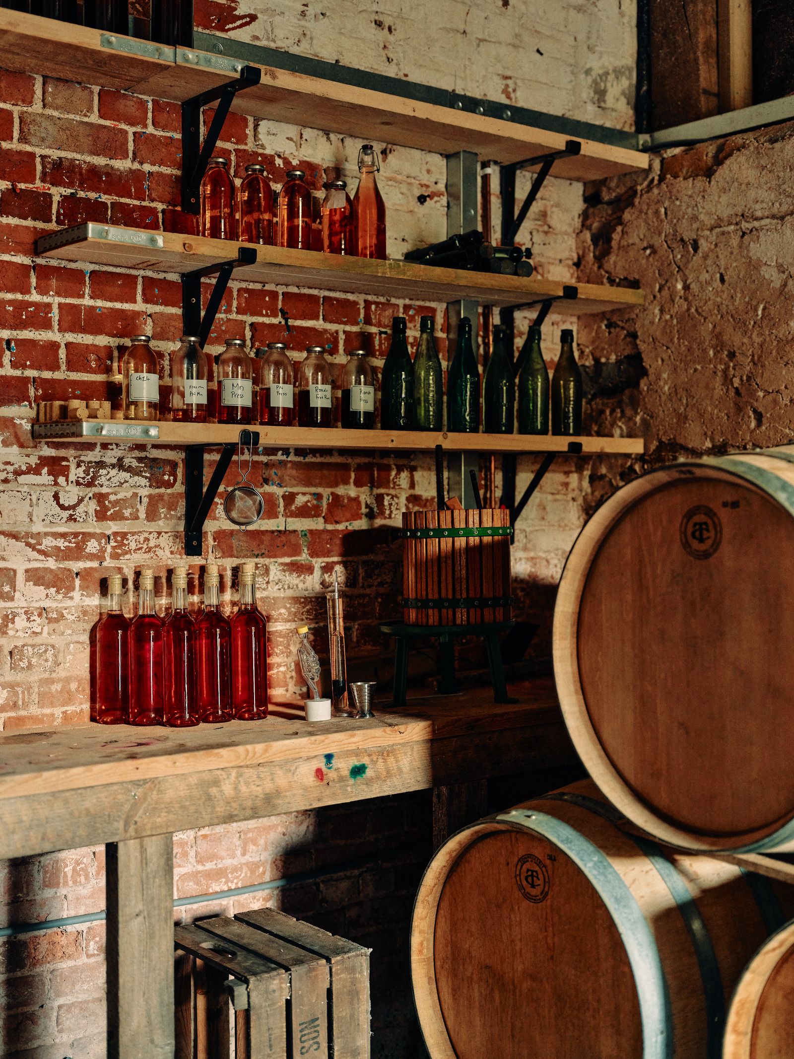 Image may contain Architecture Building Factory Alcohol Beverage Liquor Wine and Wine Cellar