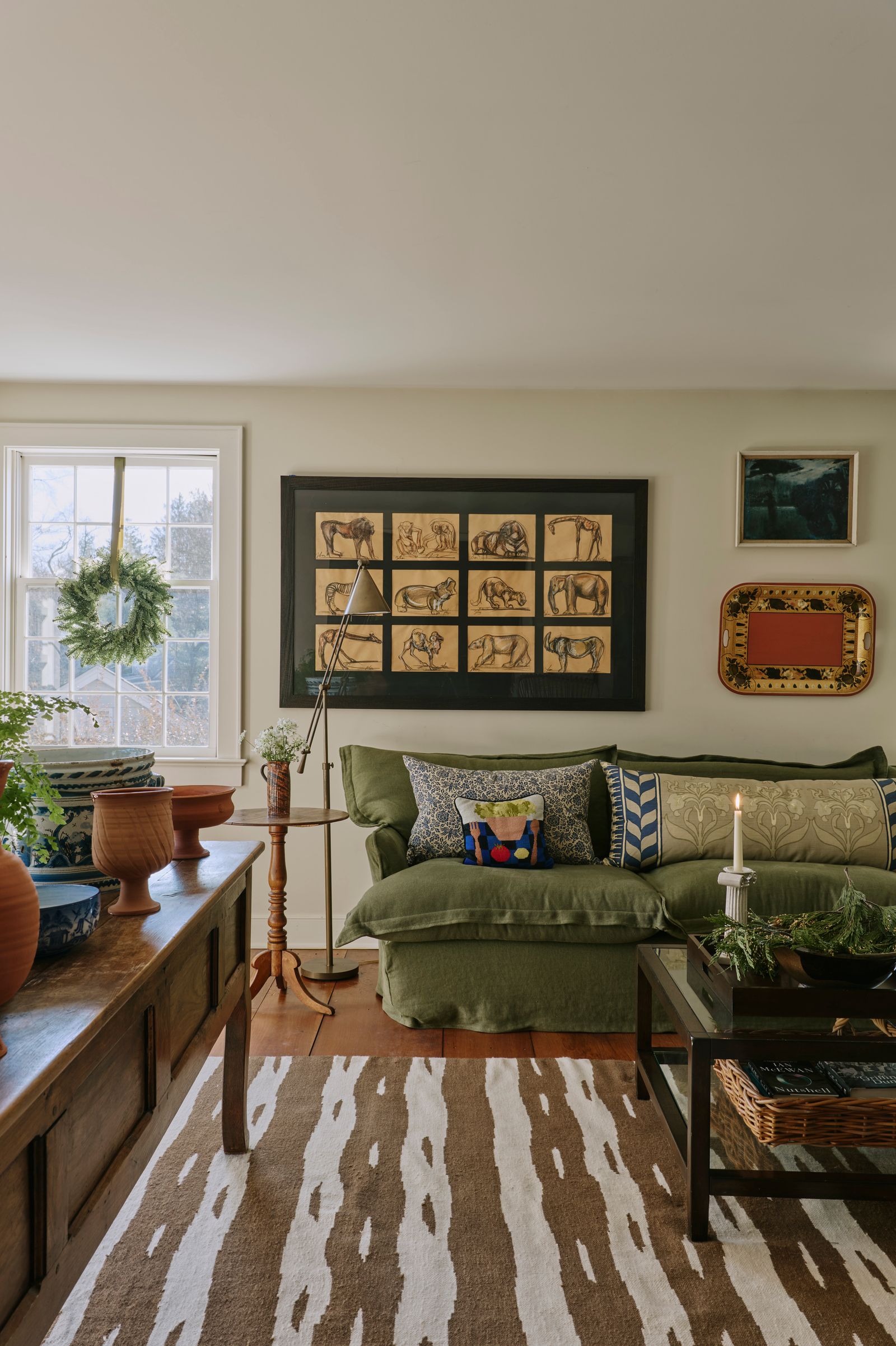 Image may contain Home Decor Indoors Interior Design Cushion Architecture Building Furniture Living Room and Room