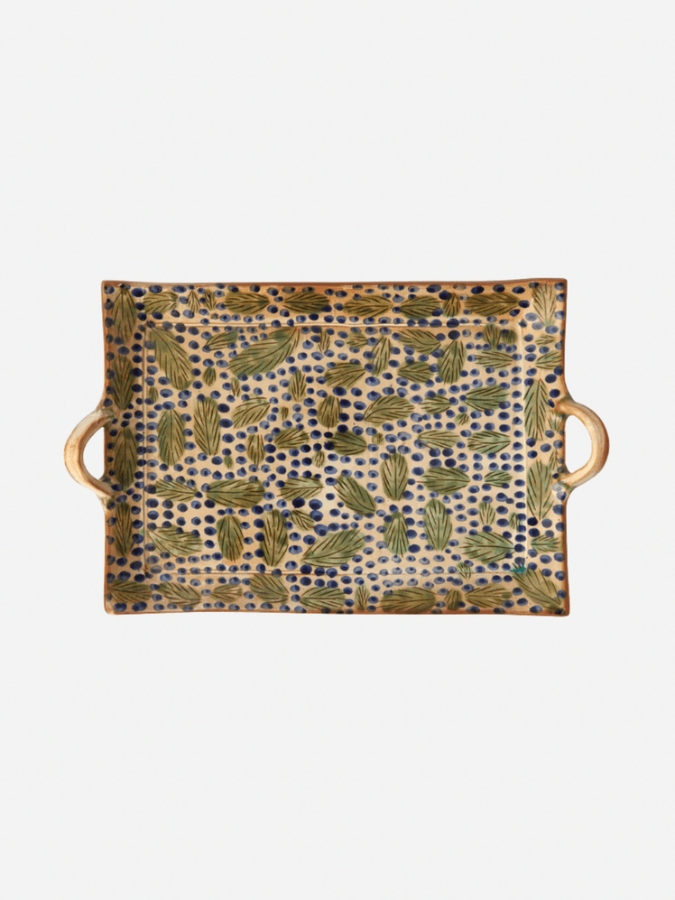 Image may contain: Home Decor, Accessories, Bag, Handbag, and Rug