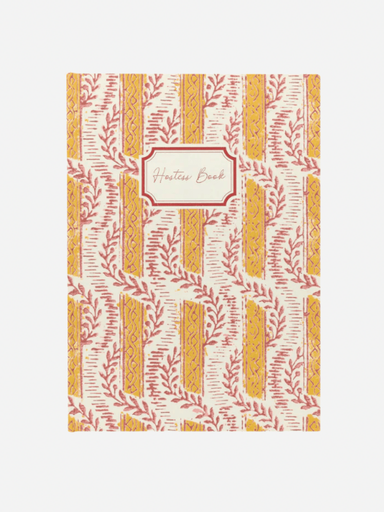 Image may contain: Home Decor, Rug, Book, and Publication