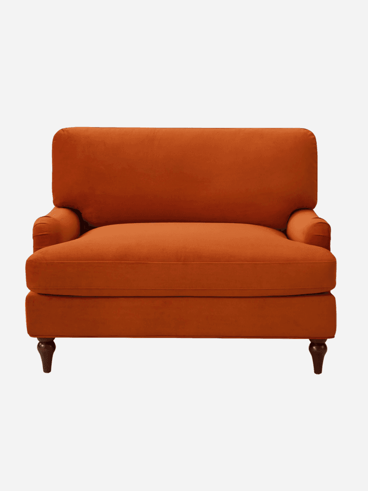 Image may contain: Couch, Furniture, Chair, Armchair, Cushion, and Home Decor