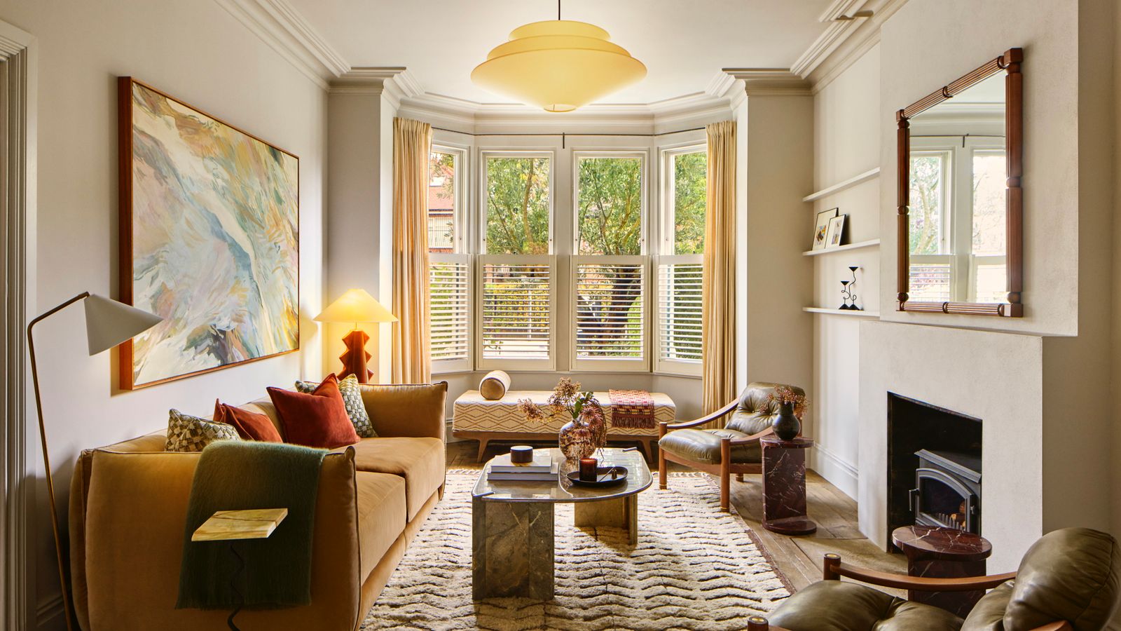 Image may contain Home Decor Window Bay Window Coffee Table Furniture and Table