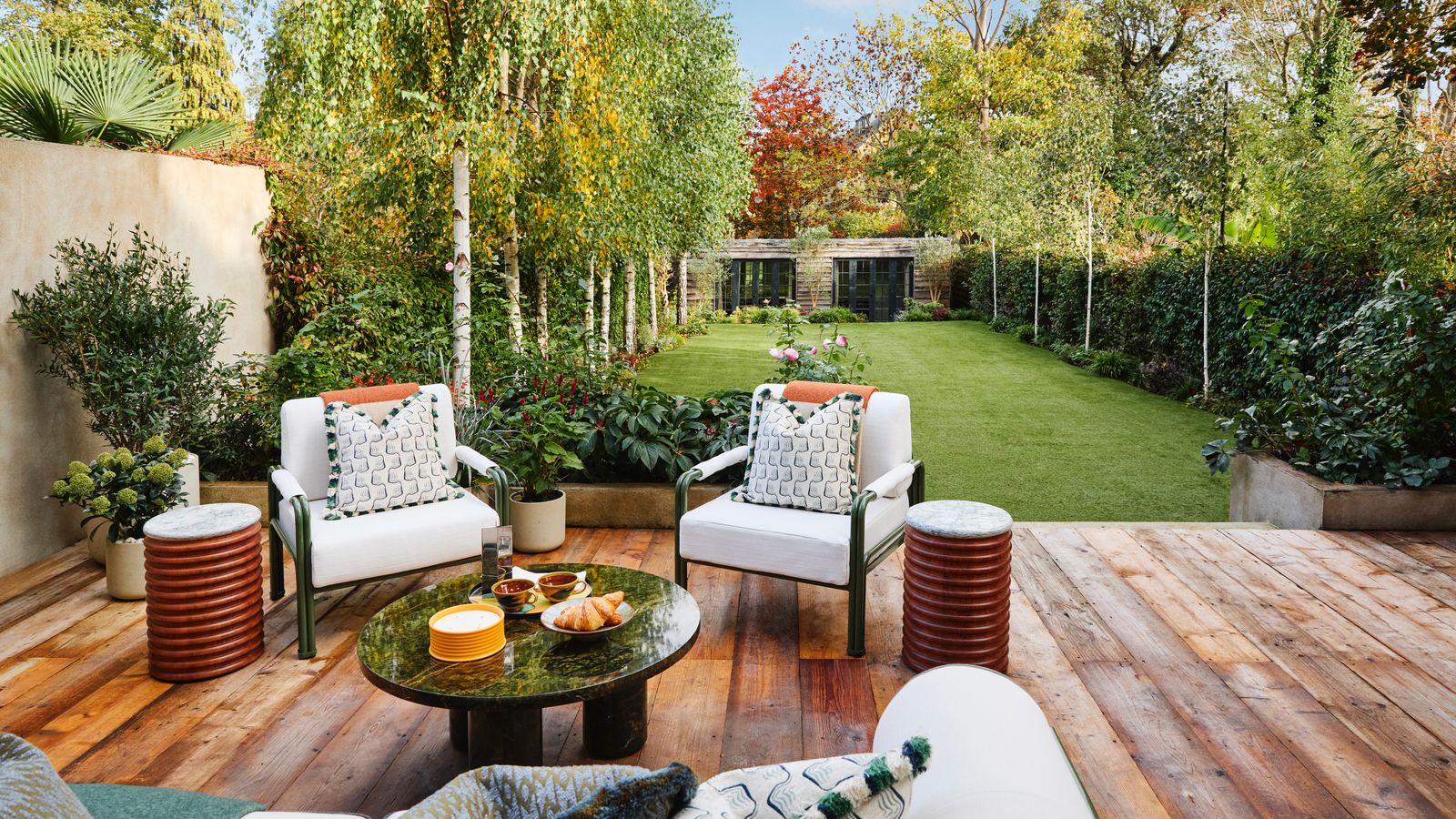 Image may contain Backyard Nature Outdoors Yard Coffee Table Furniture Table Grass Plant Chair and Garden