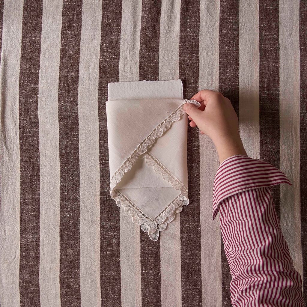 Image may contain Tablecloth and Home Decor